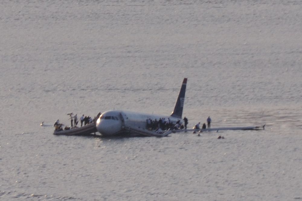 The aircraft involved with US Flight 1549 sitting in the Hudson river.