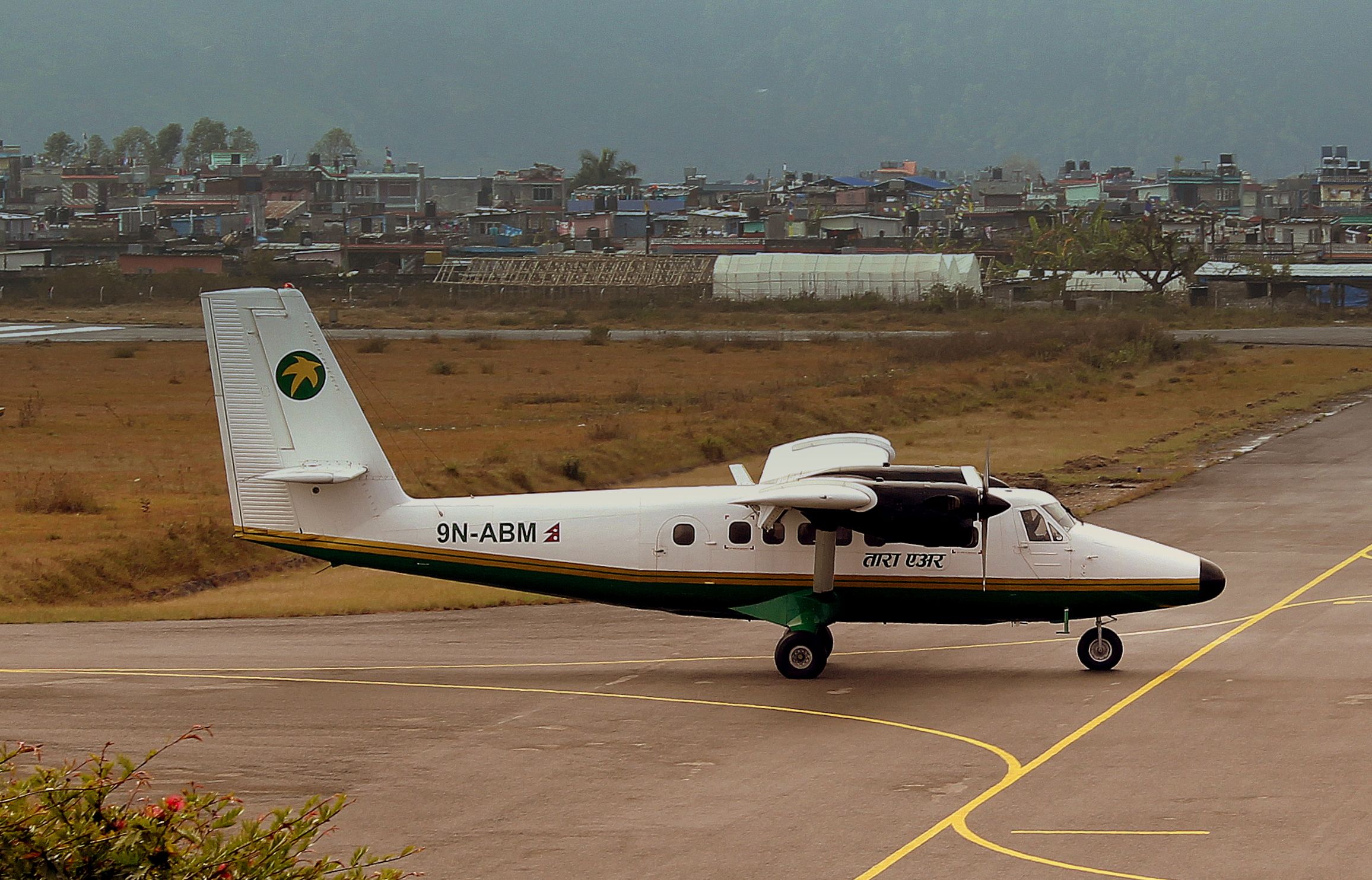 9N-ABM_TARA_AIR_DHC_6_TWIN_OTTER_AT_POKHARA_RECENTLY_ARRIVED_FROM_JOMSON_AIRPORT_NEPAL_FEB_2013_(8569369692)