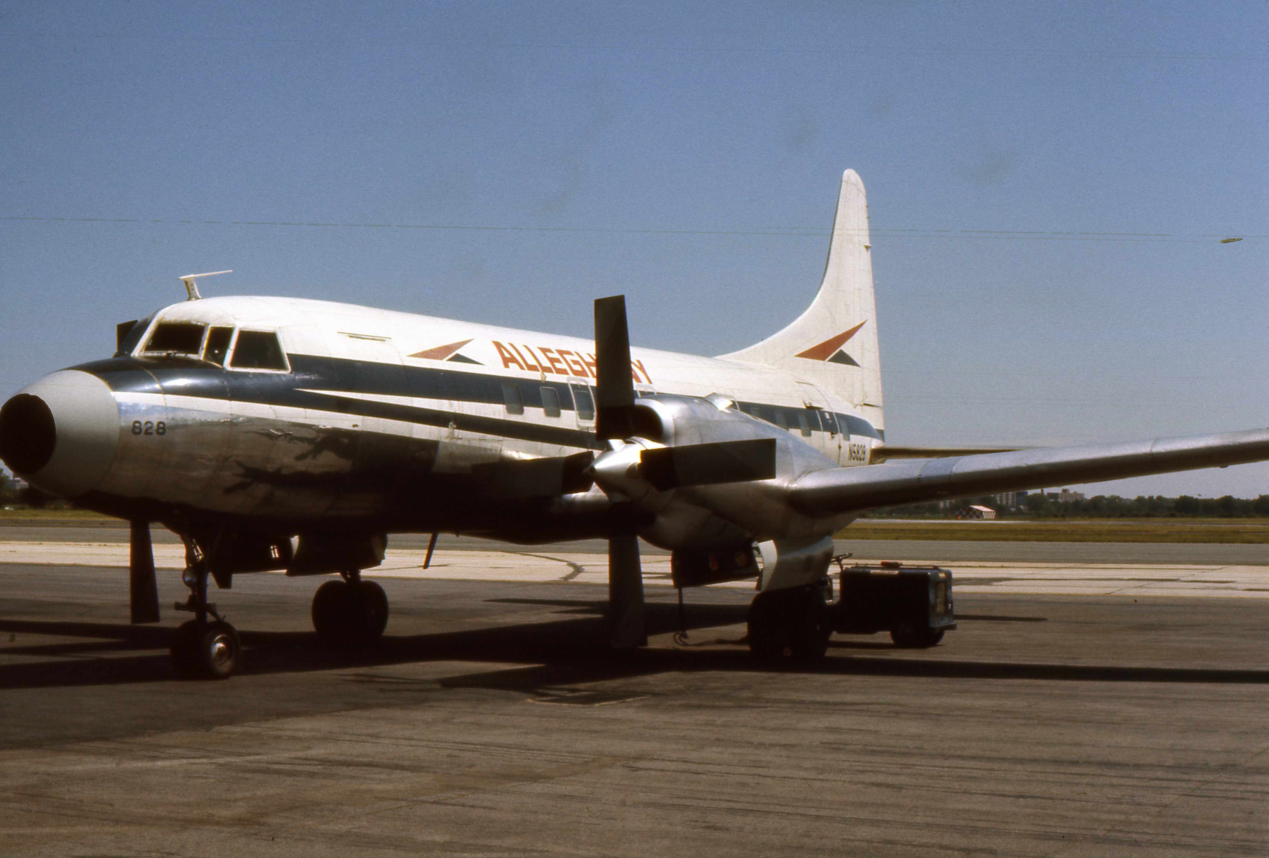 An Allegheny Airlines Convair CV-580 on an airport apron.