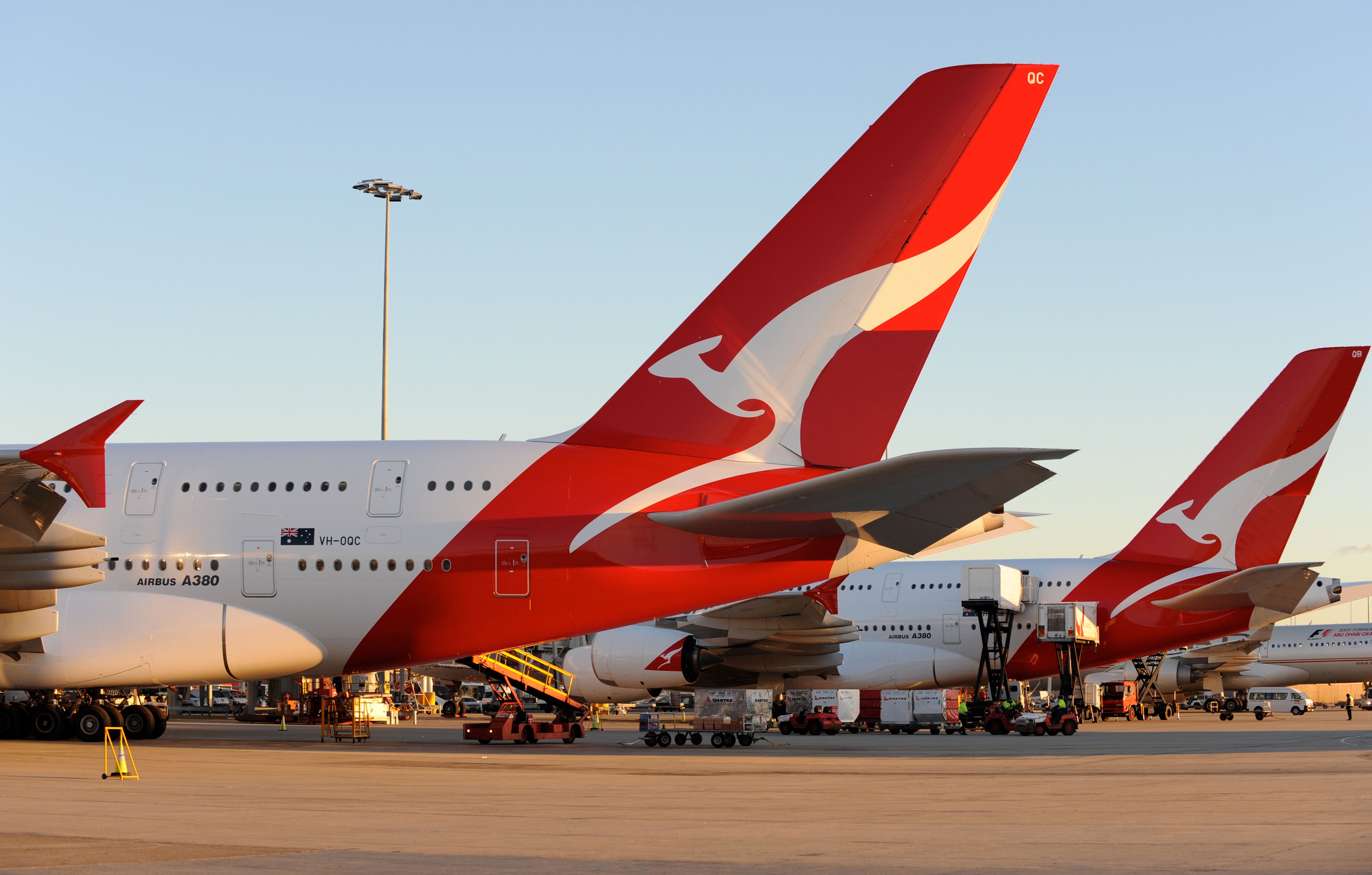 Two Qantas Airbus A380 parked on stand