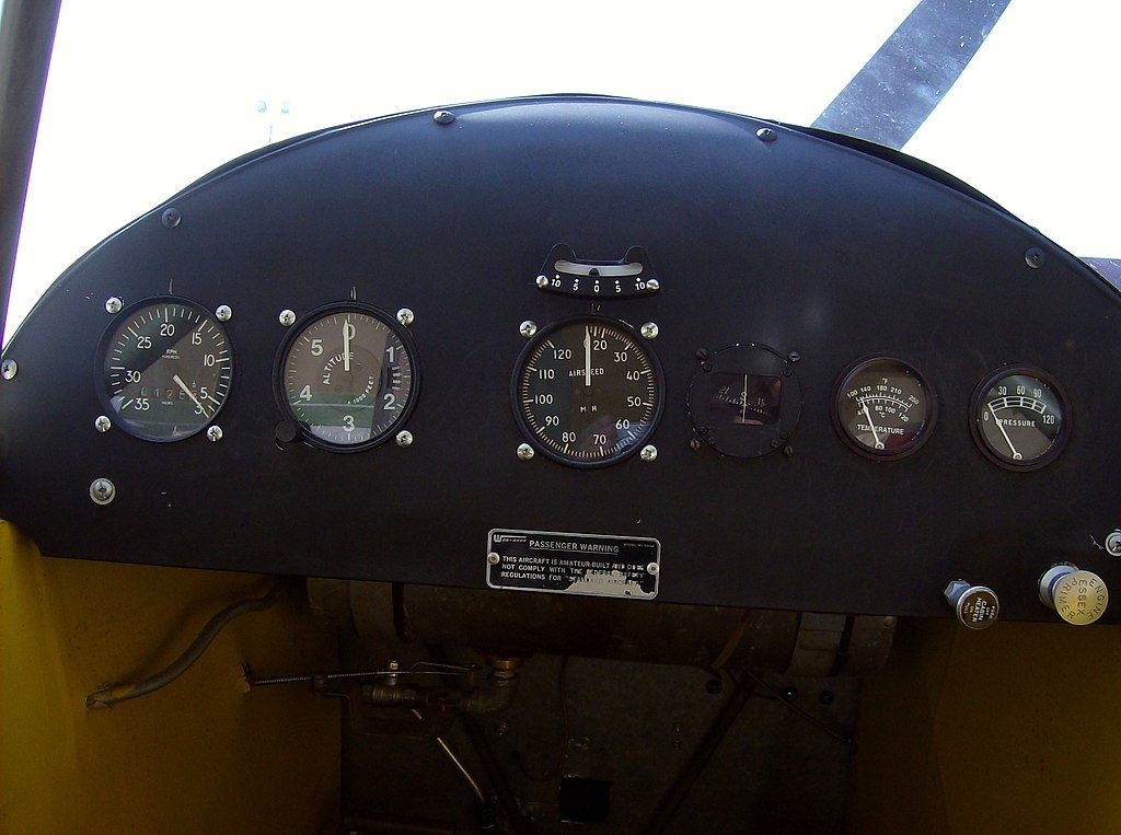 The cockpit of a Piper J-3 Cub.