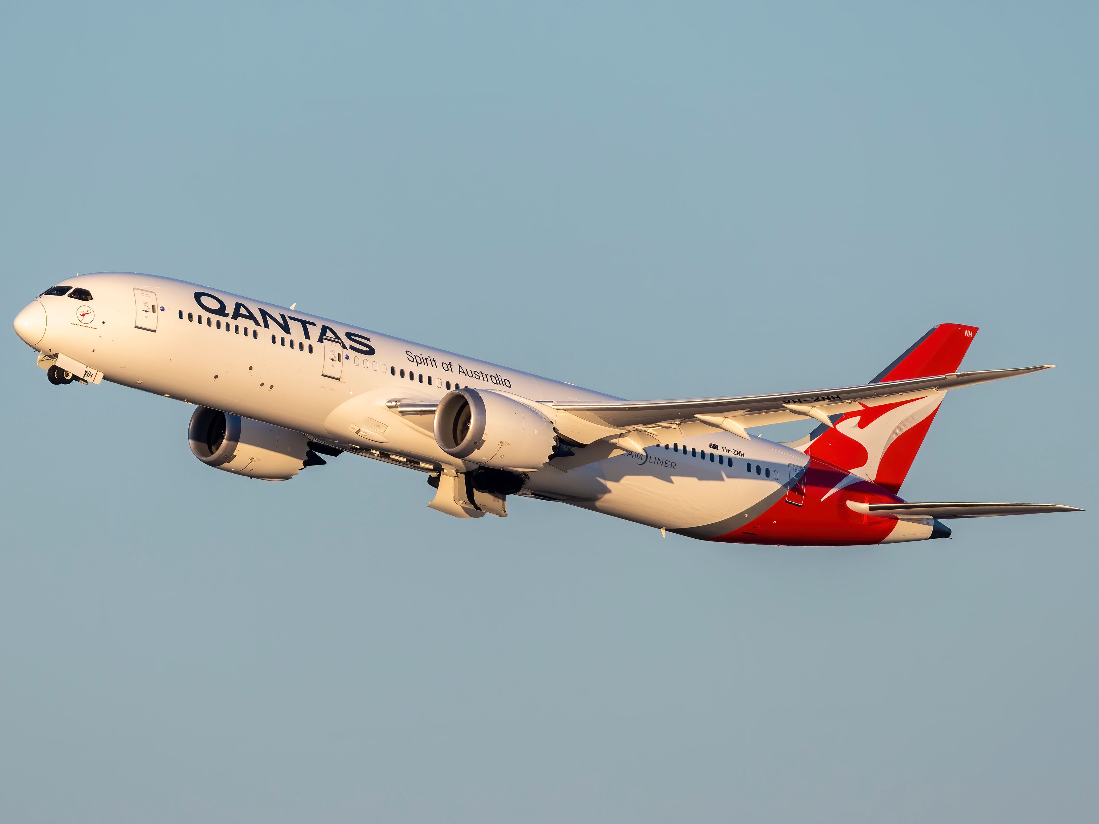 Qantas Boeing 787-9 Dreamliner against blue sky