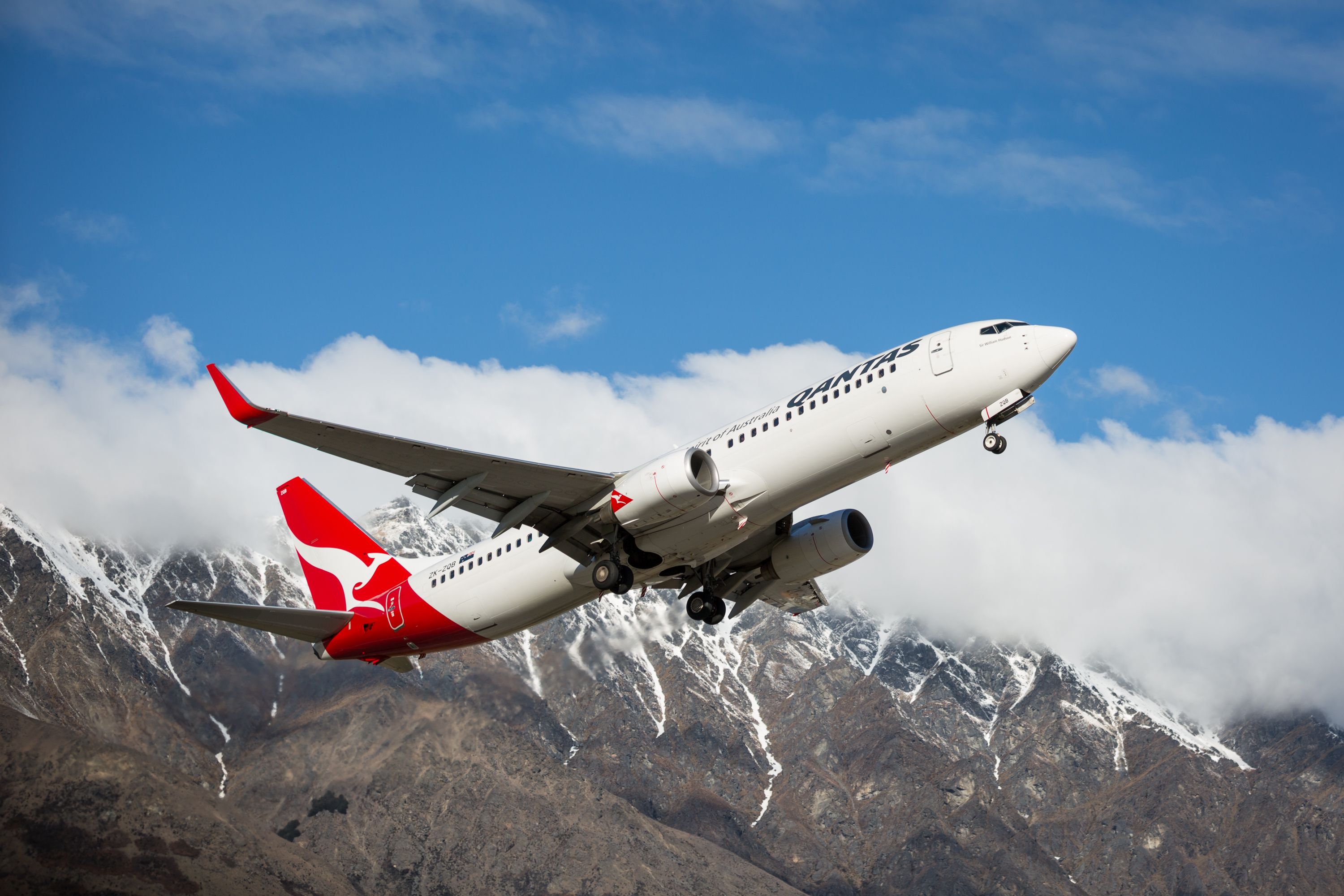 Qantas Boeing 737-800 New Zealand The Remarkables flying in front of mountain