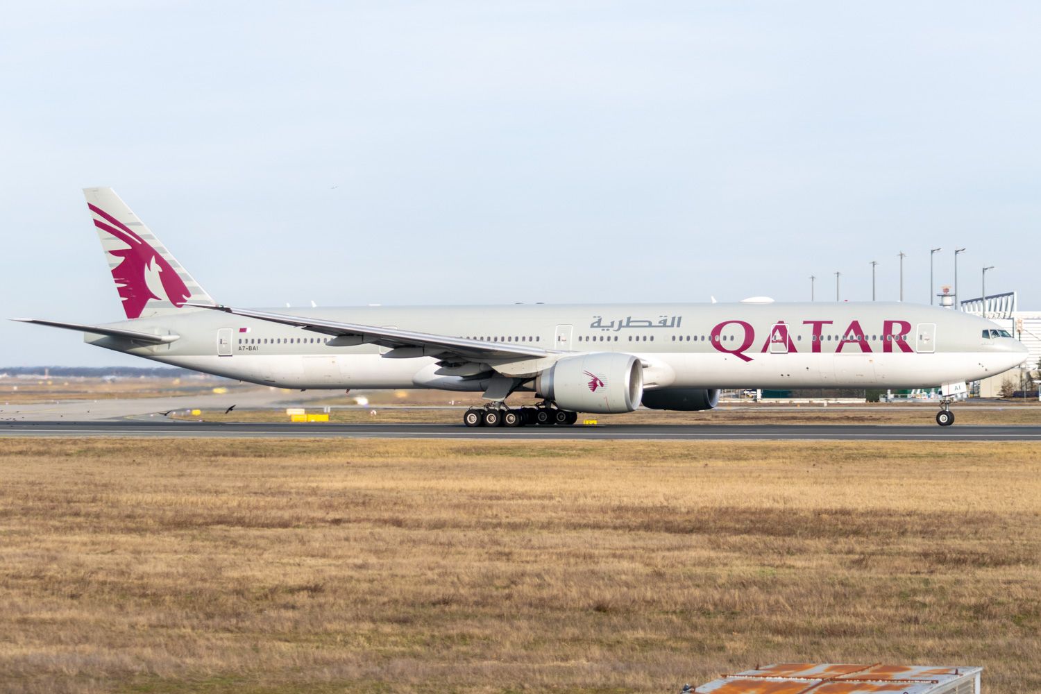 A Qatar Airways Aircraft on the airport apron.