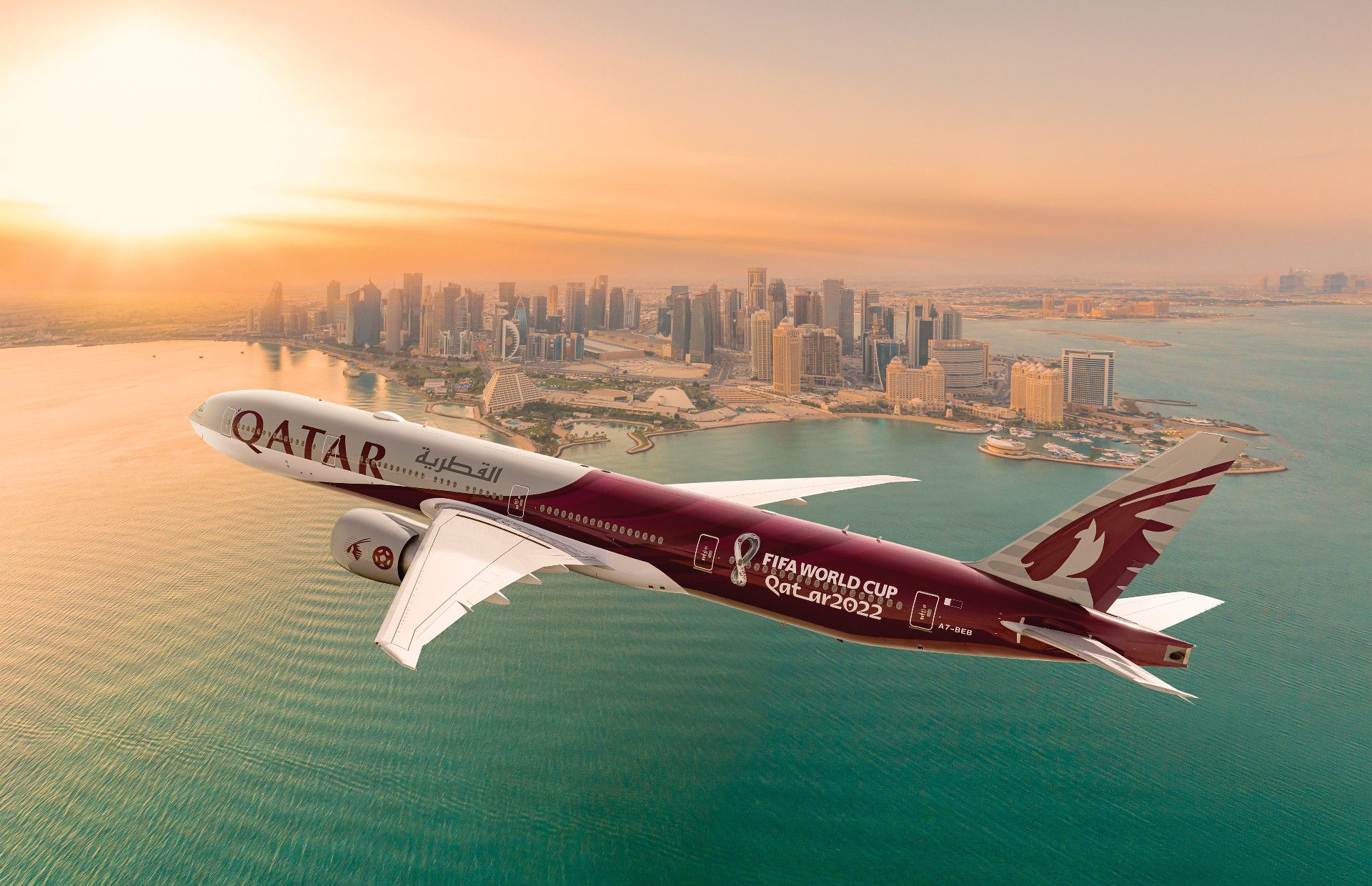Qatar Airways boeing 777 flying over the city