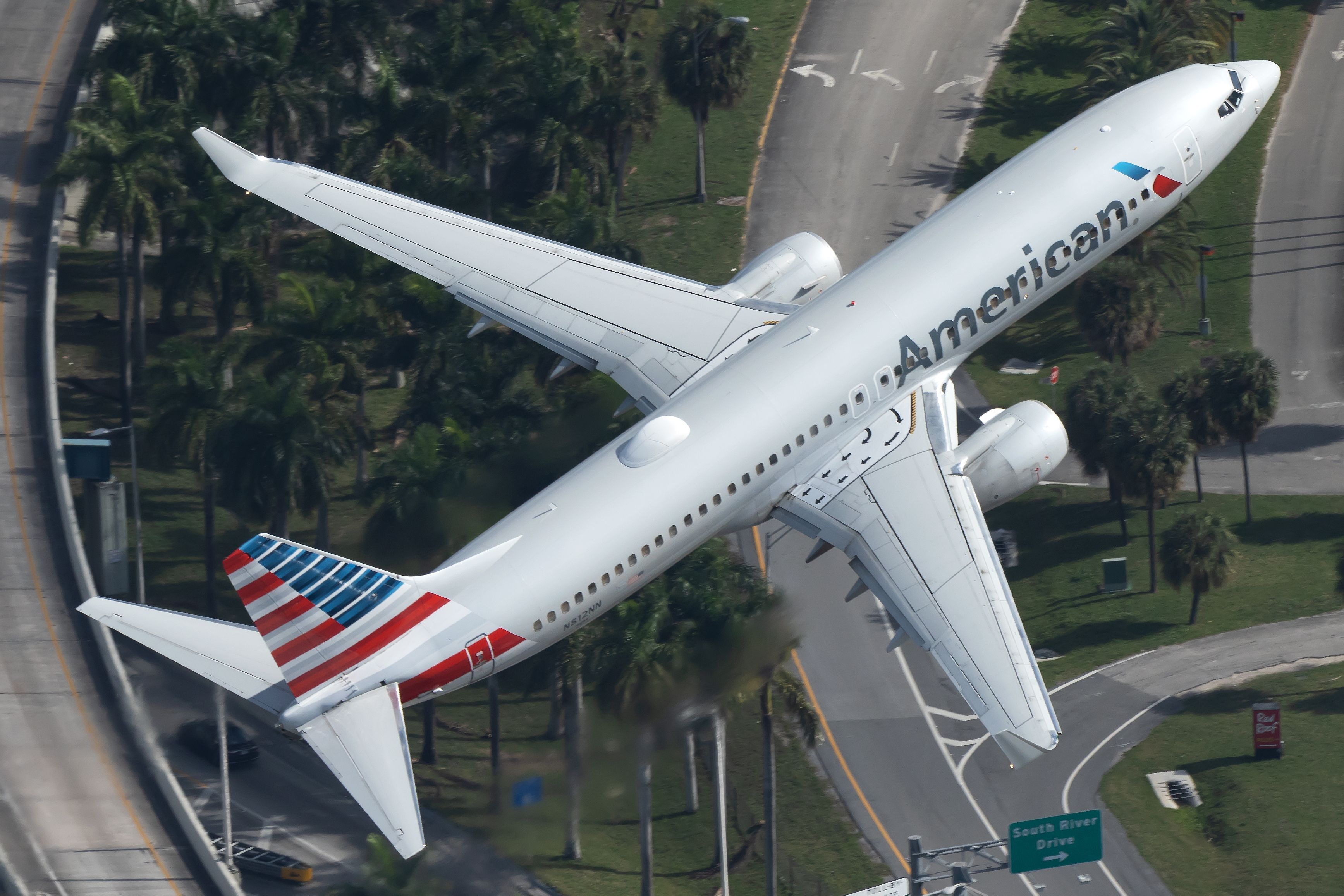 An American Airlines Boeing 737-800 flying near Miami International Airport. 