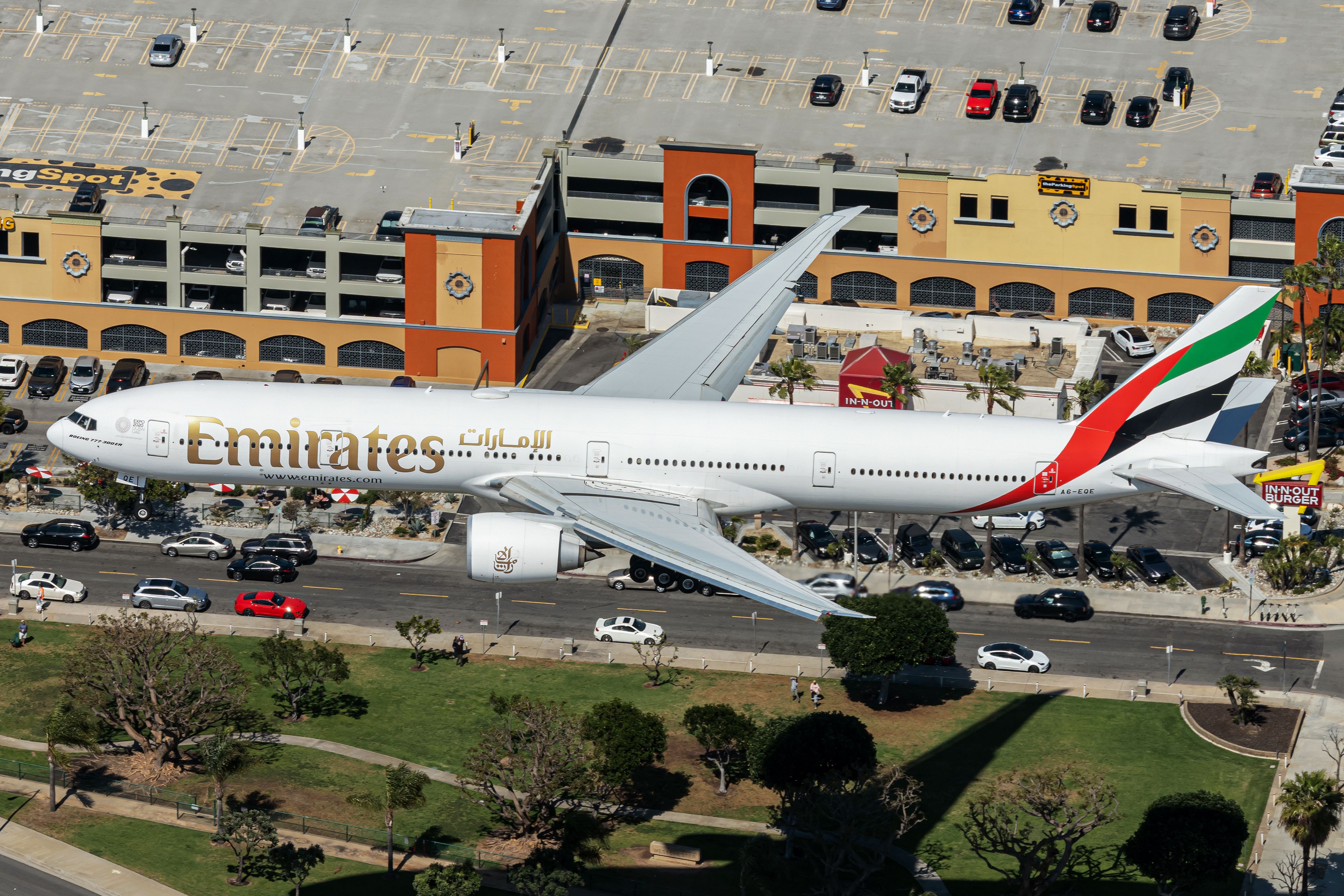 An Emirates Boeing 777-300 landing seen from above at LAX. 