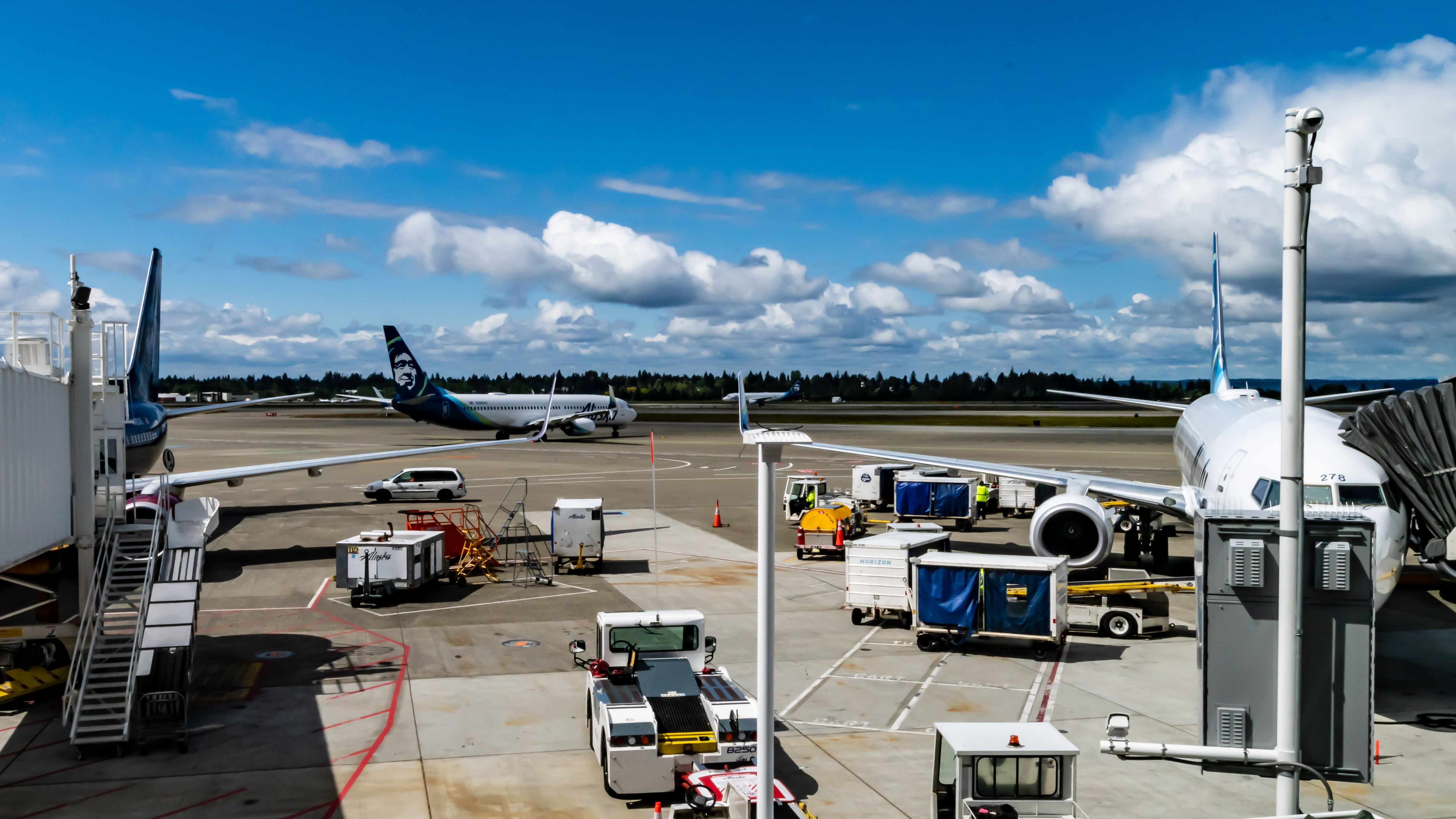 Alaska Airlines Jets Making KSEA Busy - Seattle-Tacoma International Airport flight ops as seen from one of the gates