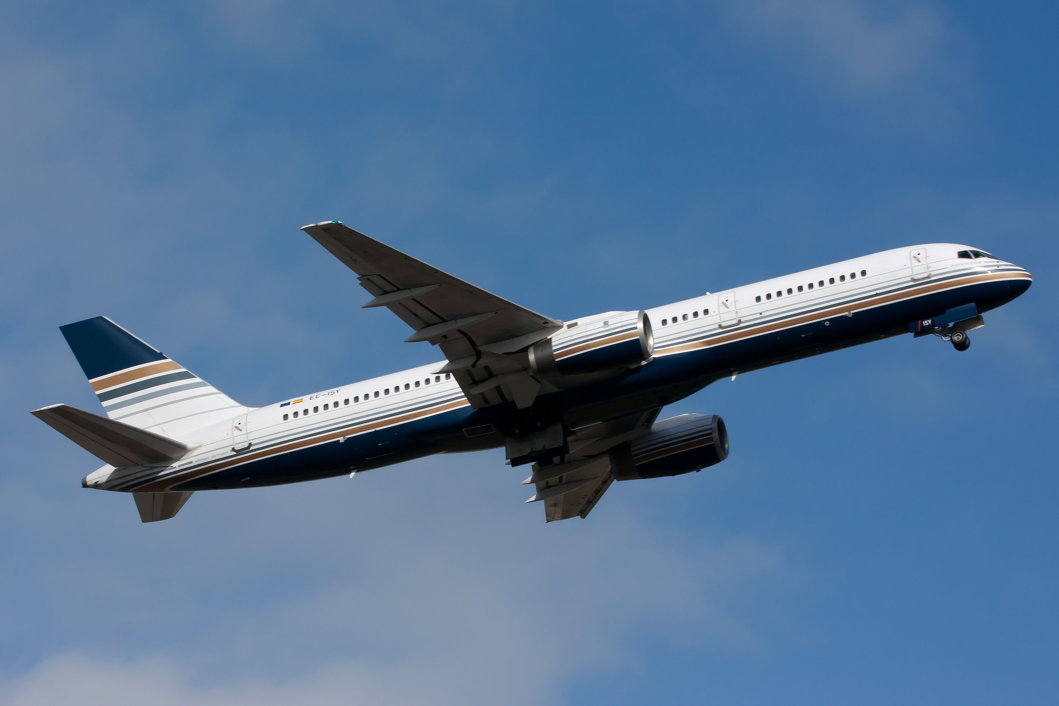 A Privilege Style Boeing 757-200 Against A Blue Sky Bckdrop