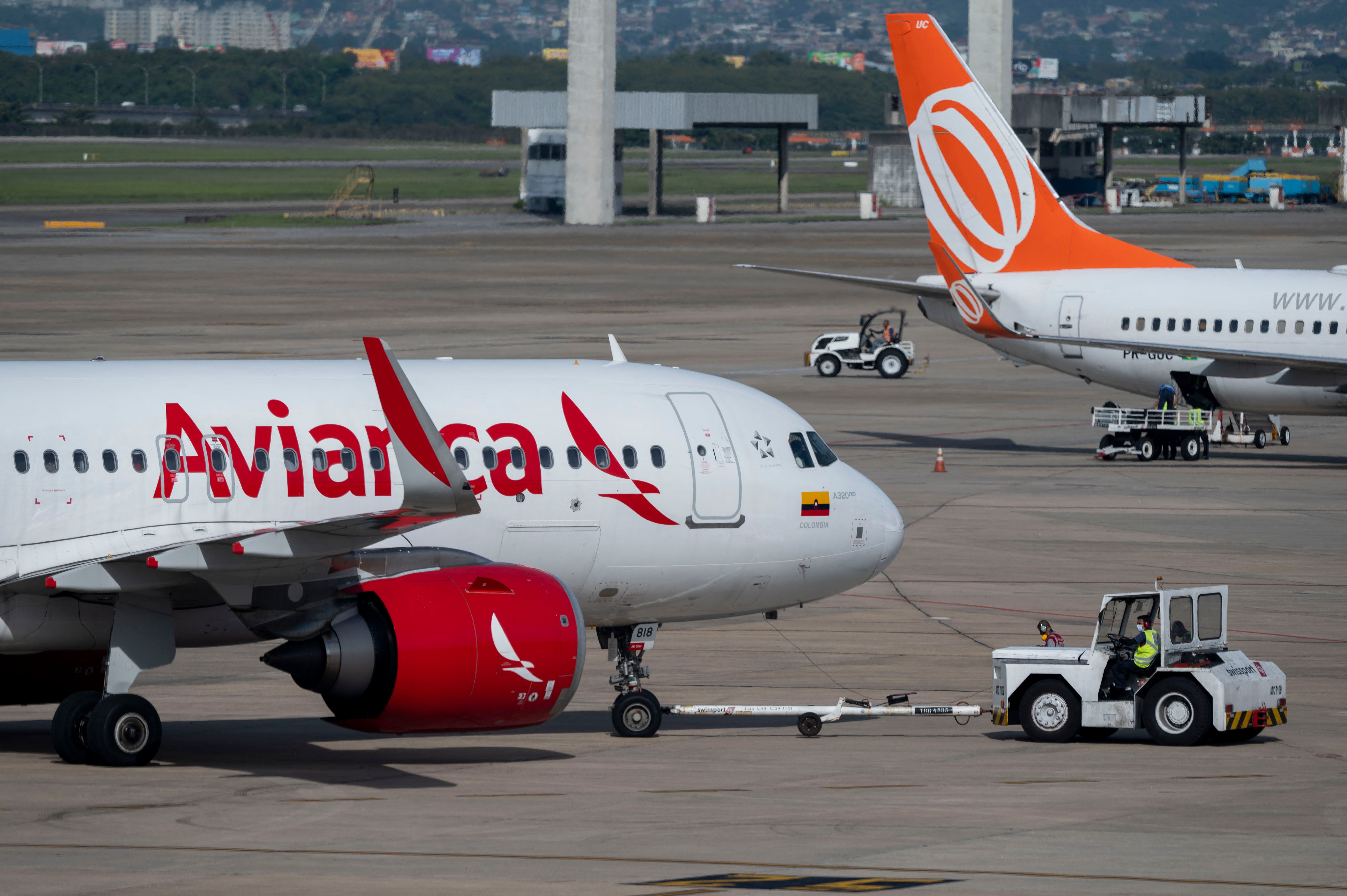 We see an Avianca aircraft and the tail of a GOL Boeing 737 