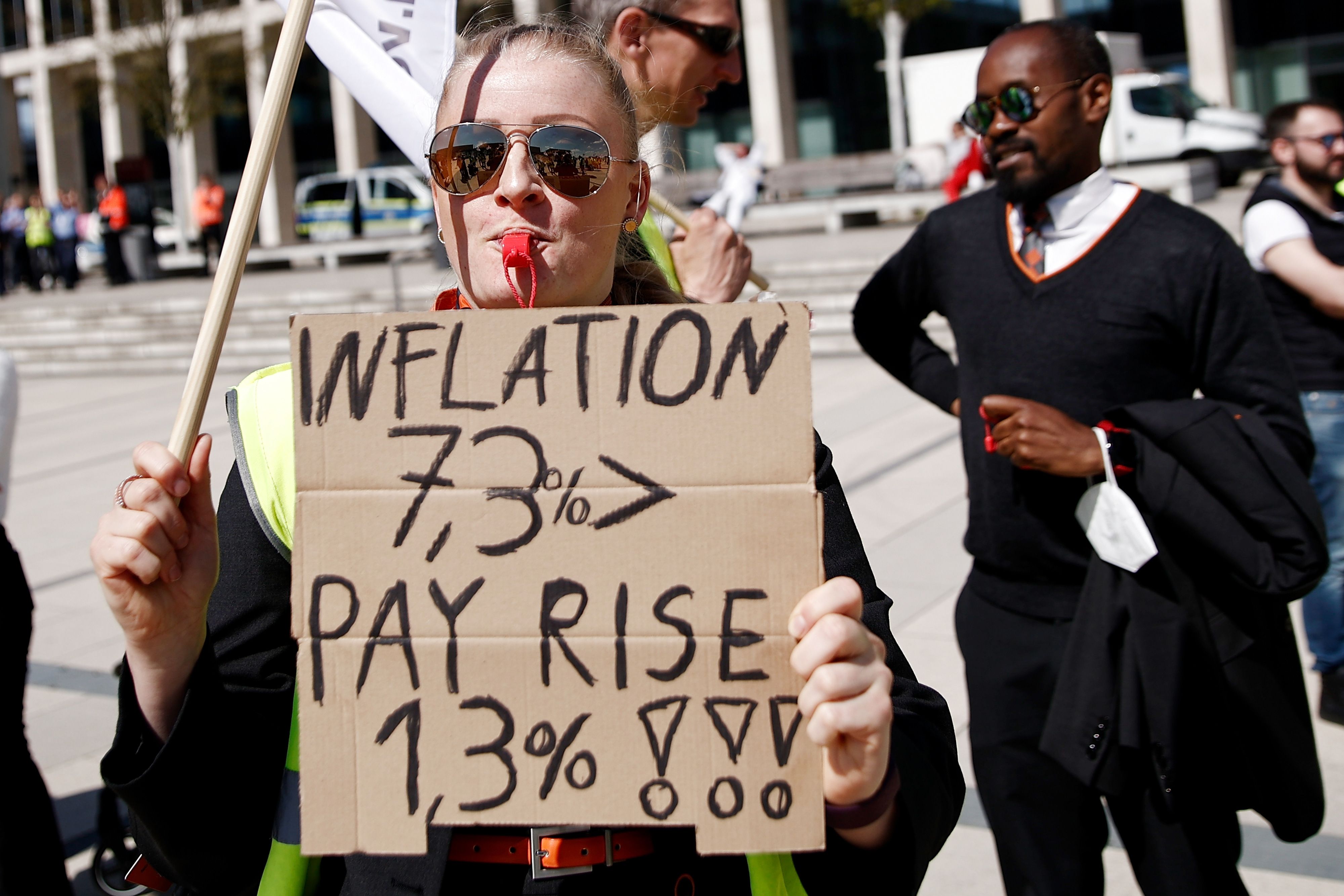 An easyJet female cabin crew member protesting for a pay rise. 