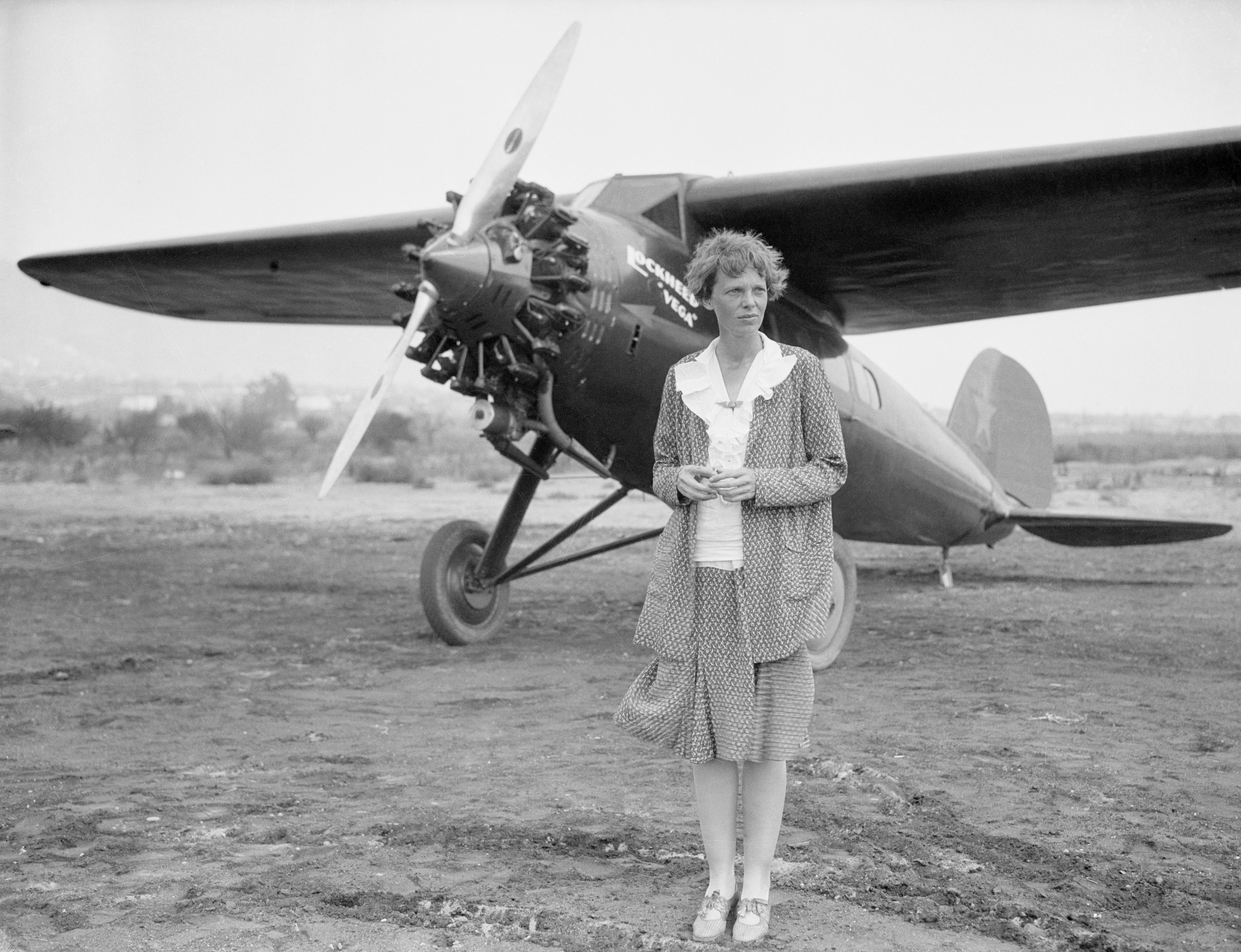 Amelia Earhart at Long Beach, Ca, with her plane.