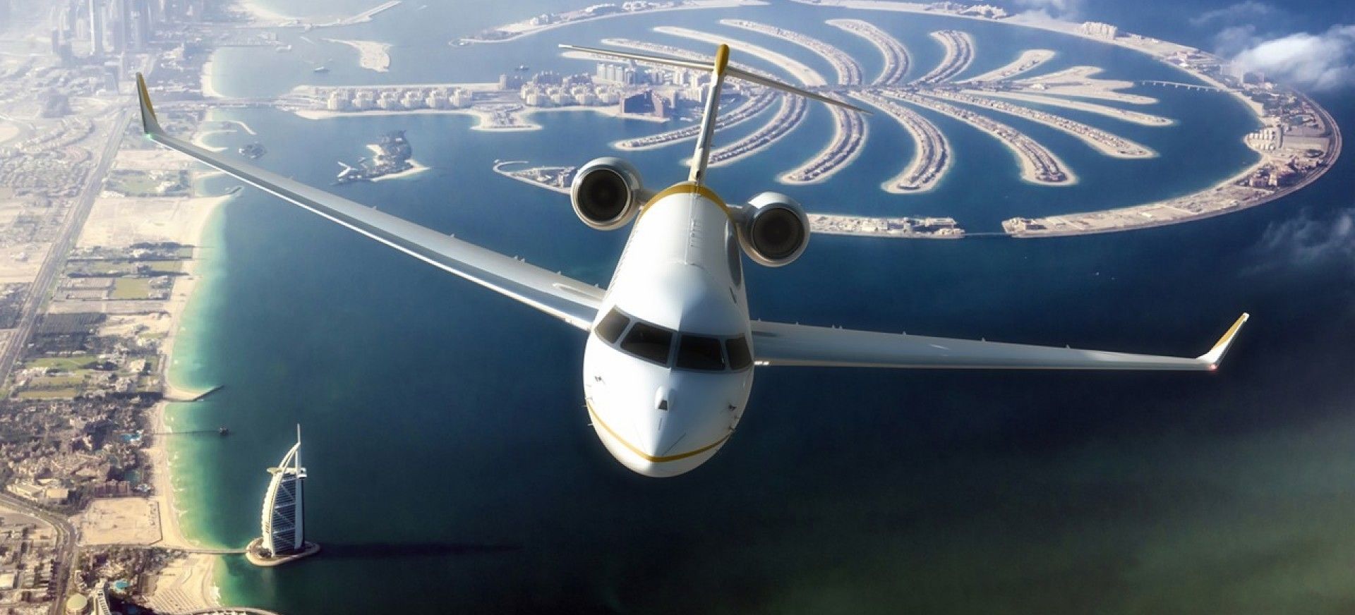 A Bombardier Global 7500 flying past the Dubai Skyline.