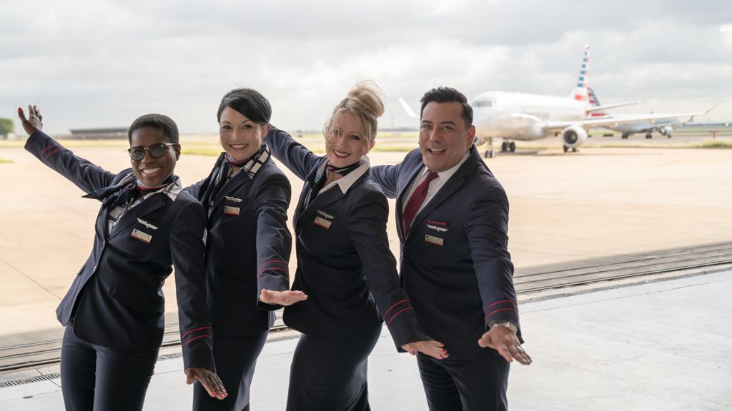 Envoy Air crew in front of plane