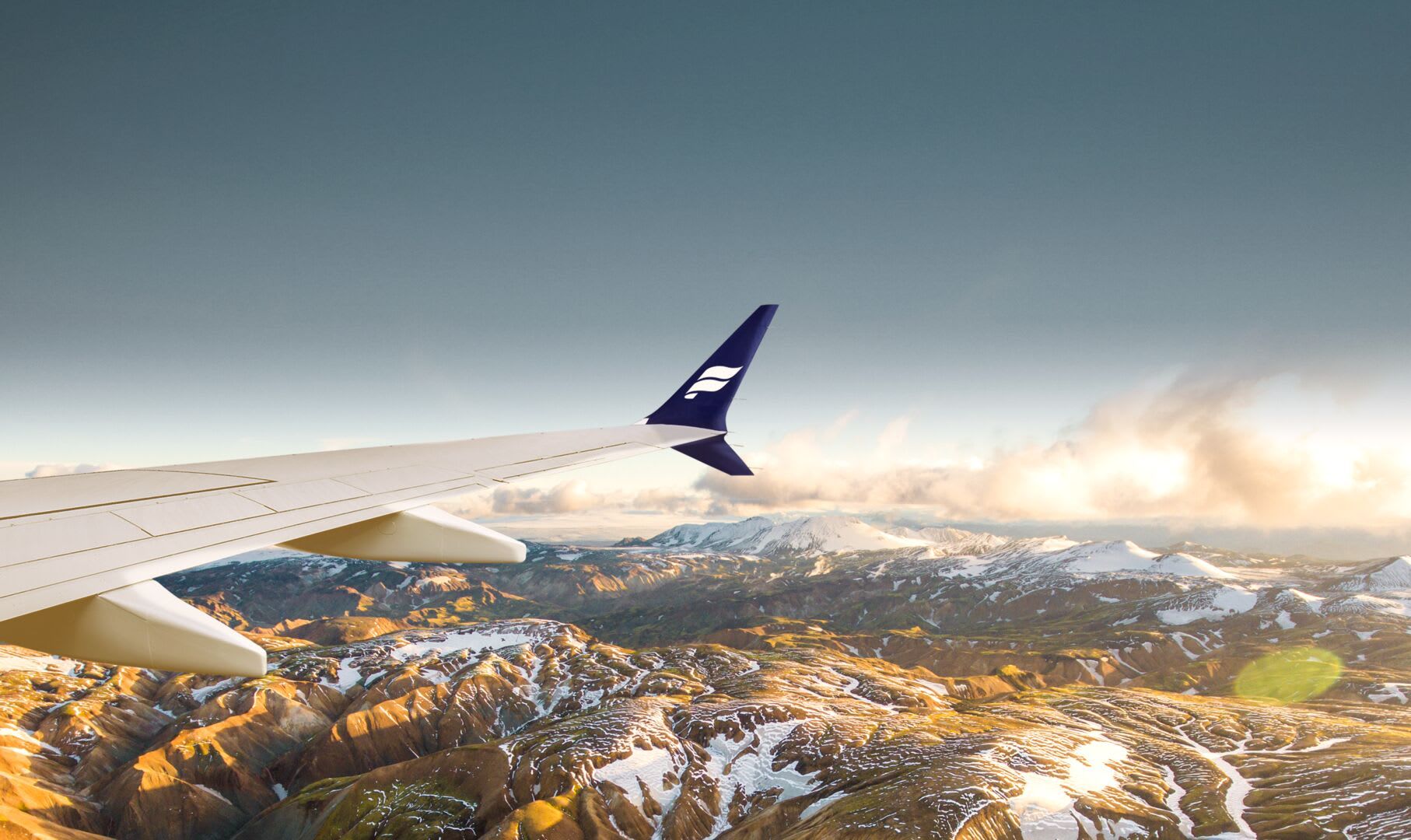 Icelandair Wingtip With Mountains Backdrop