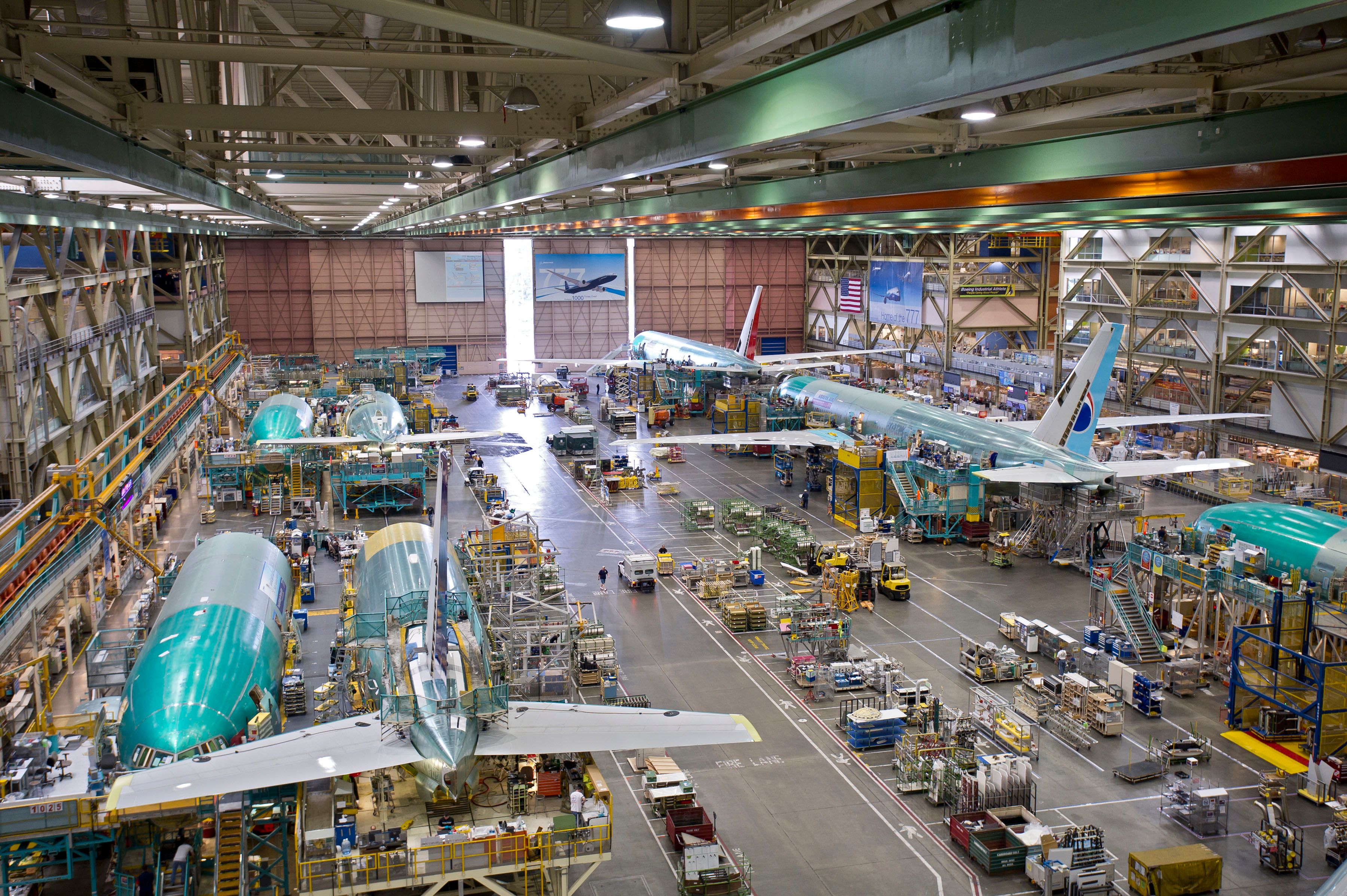 Several Boeing aircraft being produced.
