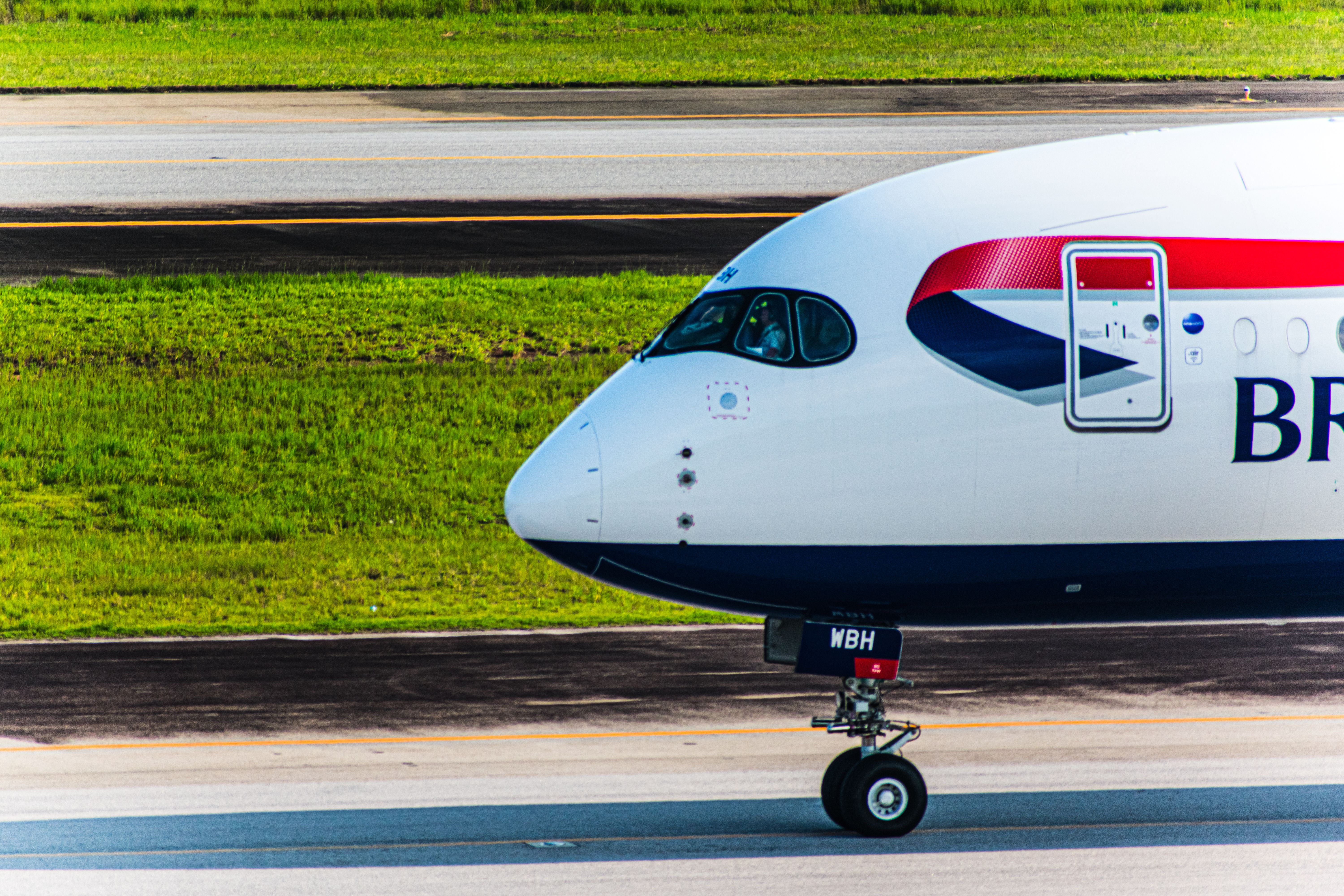 The nose of a British Airways Airbus A350-1000 on a taxiway.