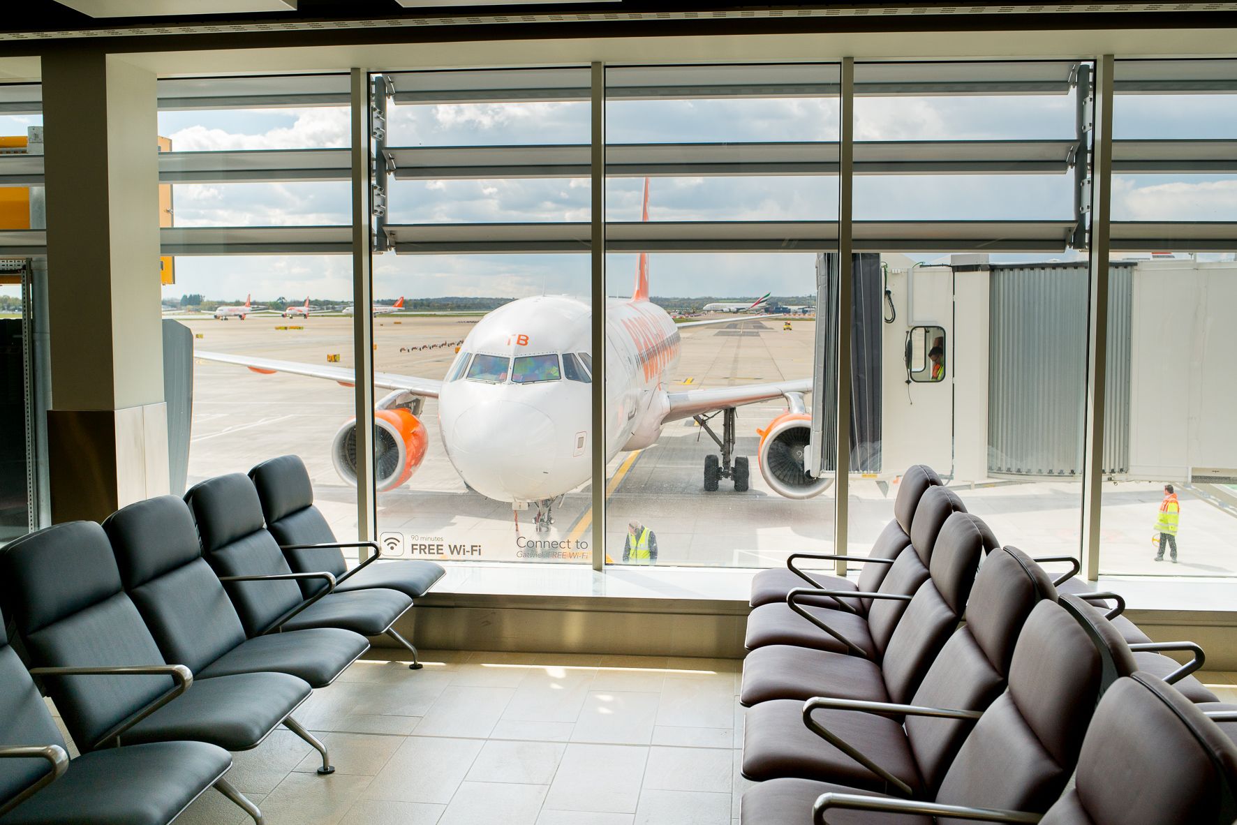 A view of an easyJet aircraft from inside Gatwick Airport. 