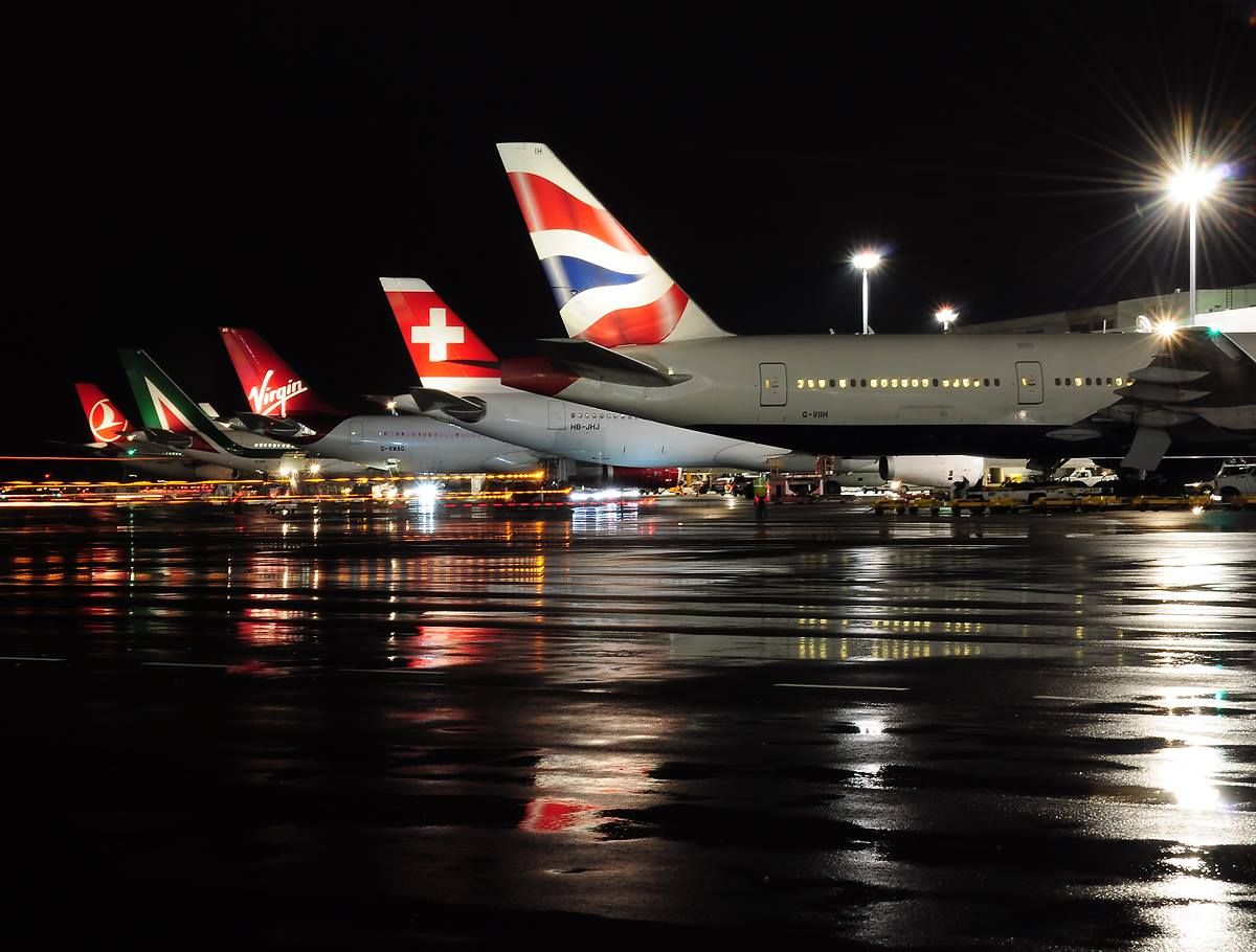 Planes-Parked-At-Gates-At-Night-At-Boston-Logan-International-Airport