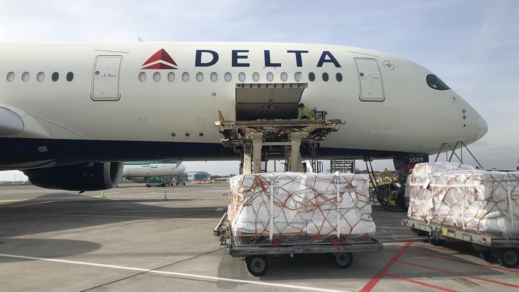 cargo_hero_image - Loading a Delta Air Lines jet with Kendamil Organic and Classic formula