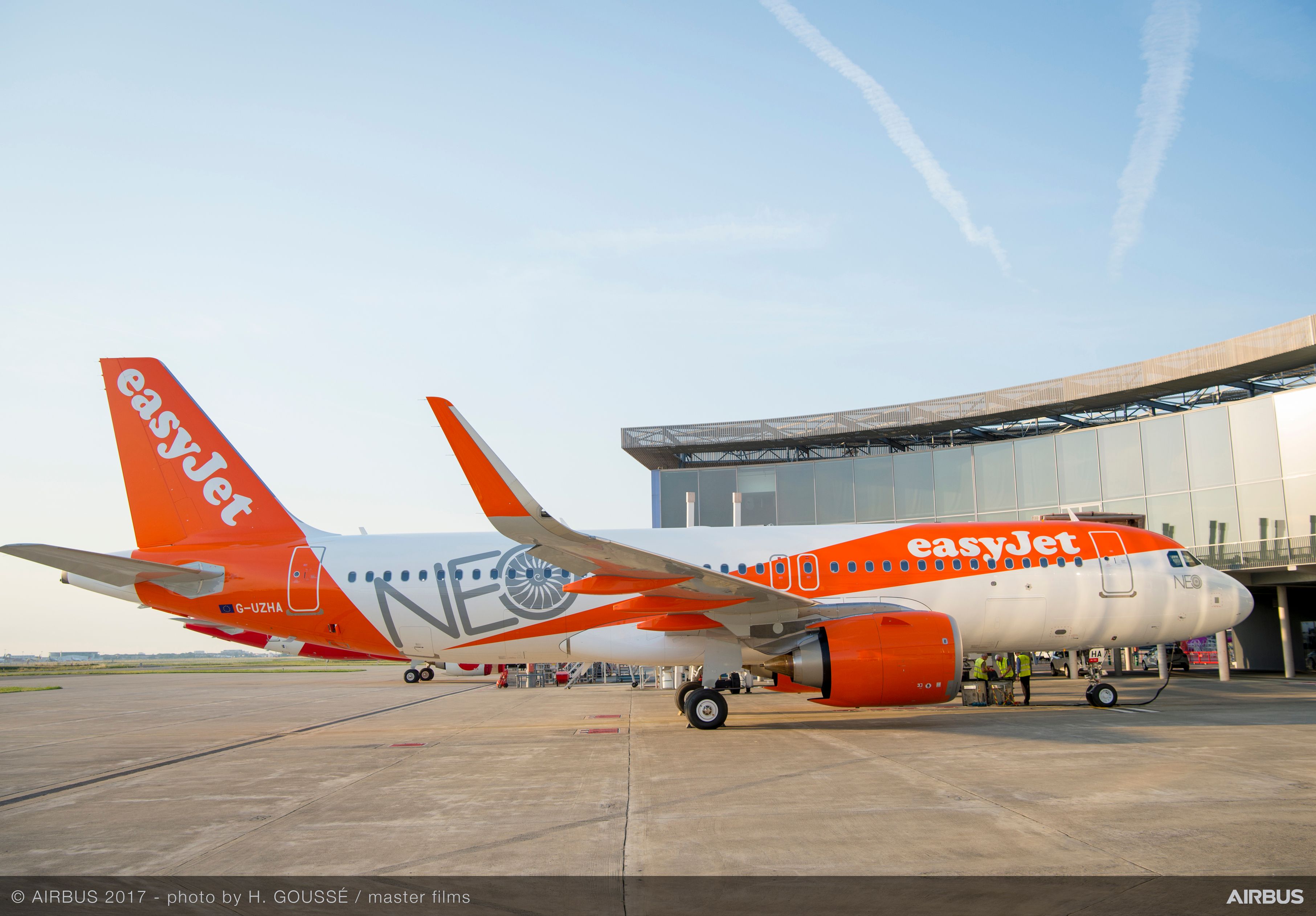 easyJet A320neo aircraft standing by terminal