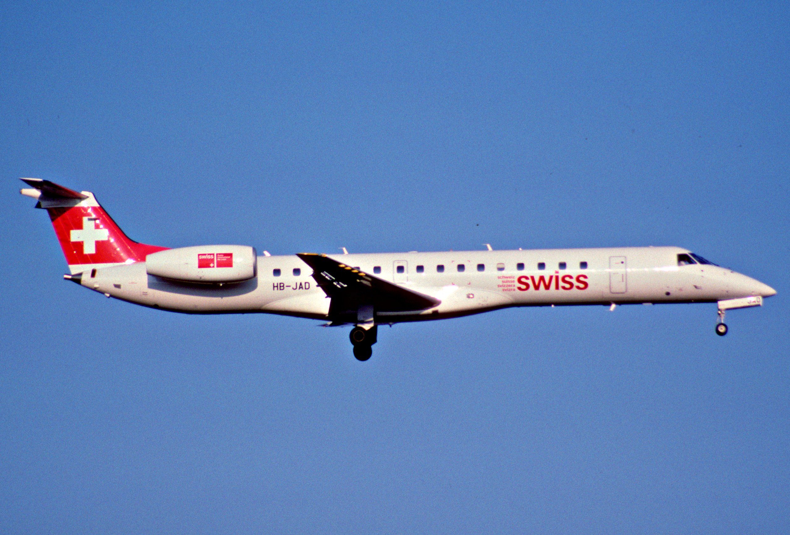 A SWISS Embraer ERJ145 Flying in the sky.