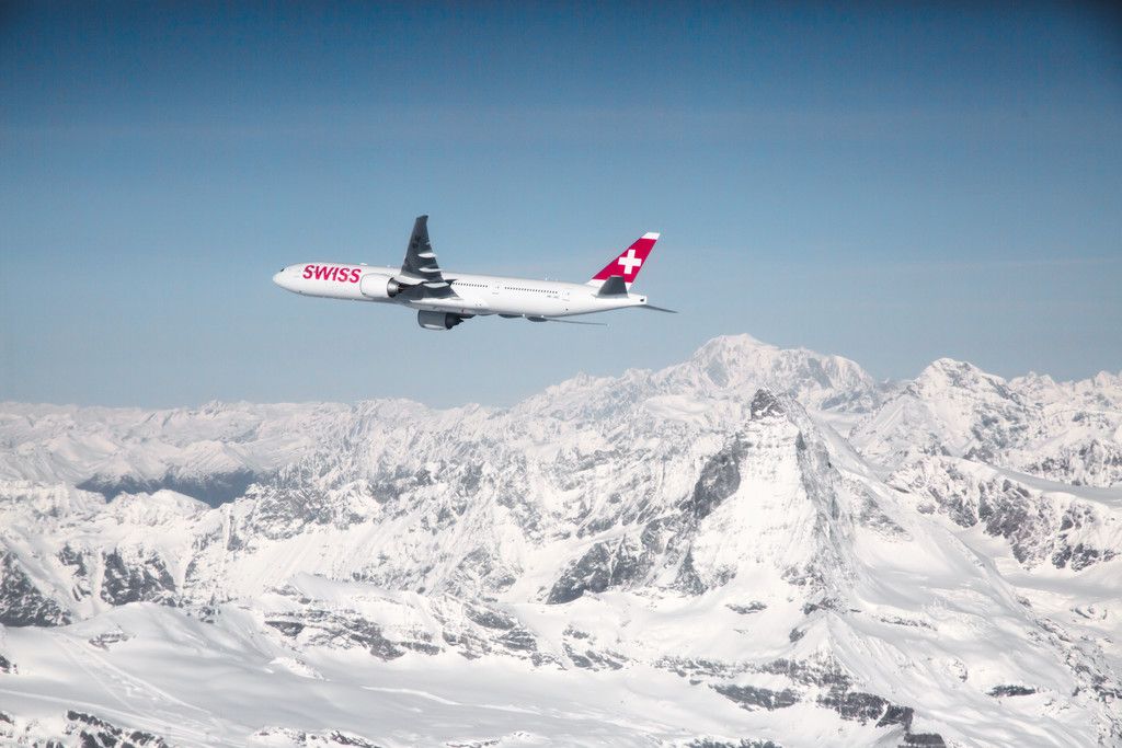 777_44 - A Swiss Airlines Boeing 777 Flying Over Snowy Alps