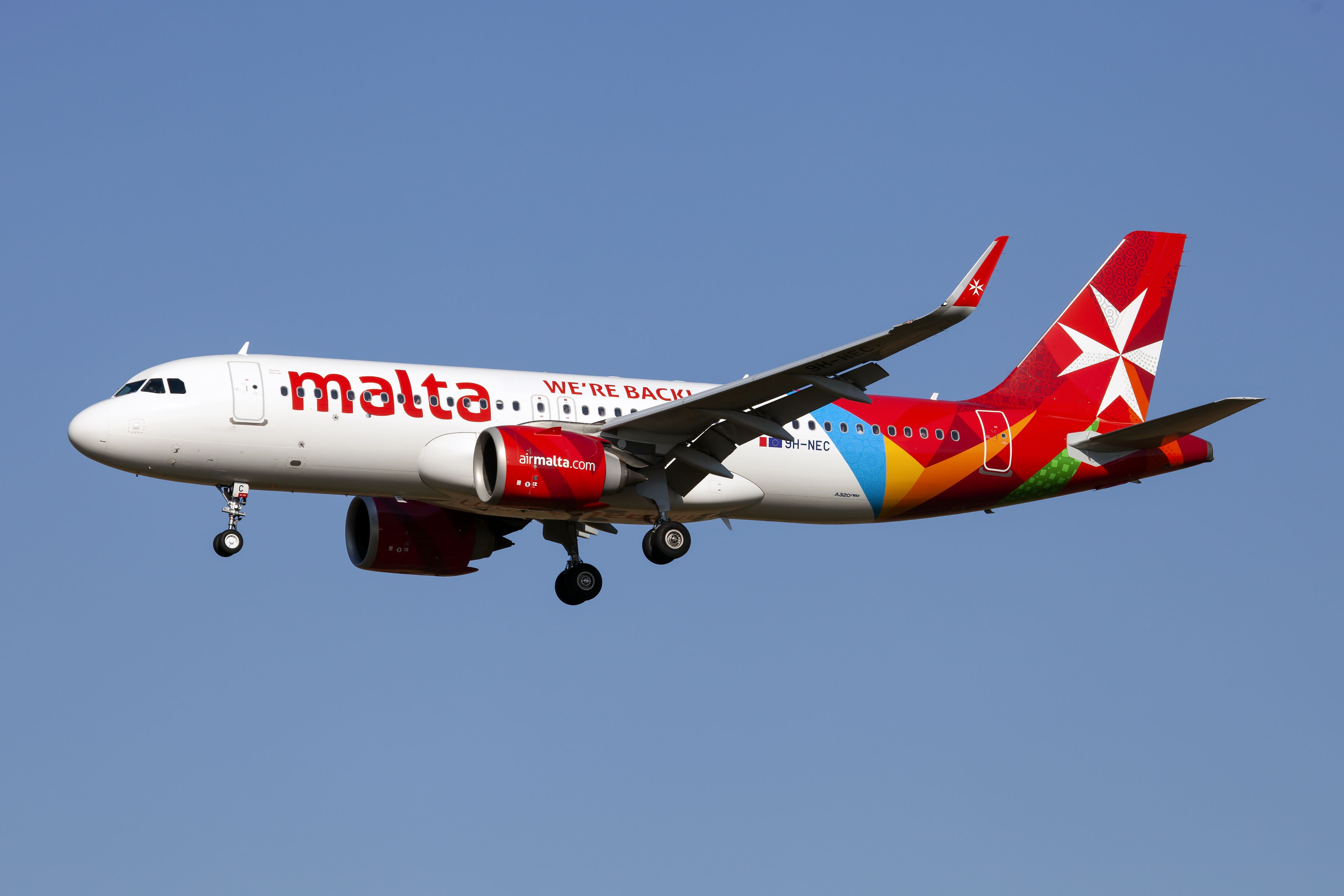 Air Malta A320neo aircraft against blue sky