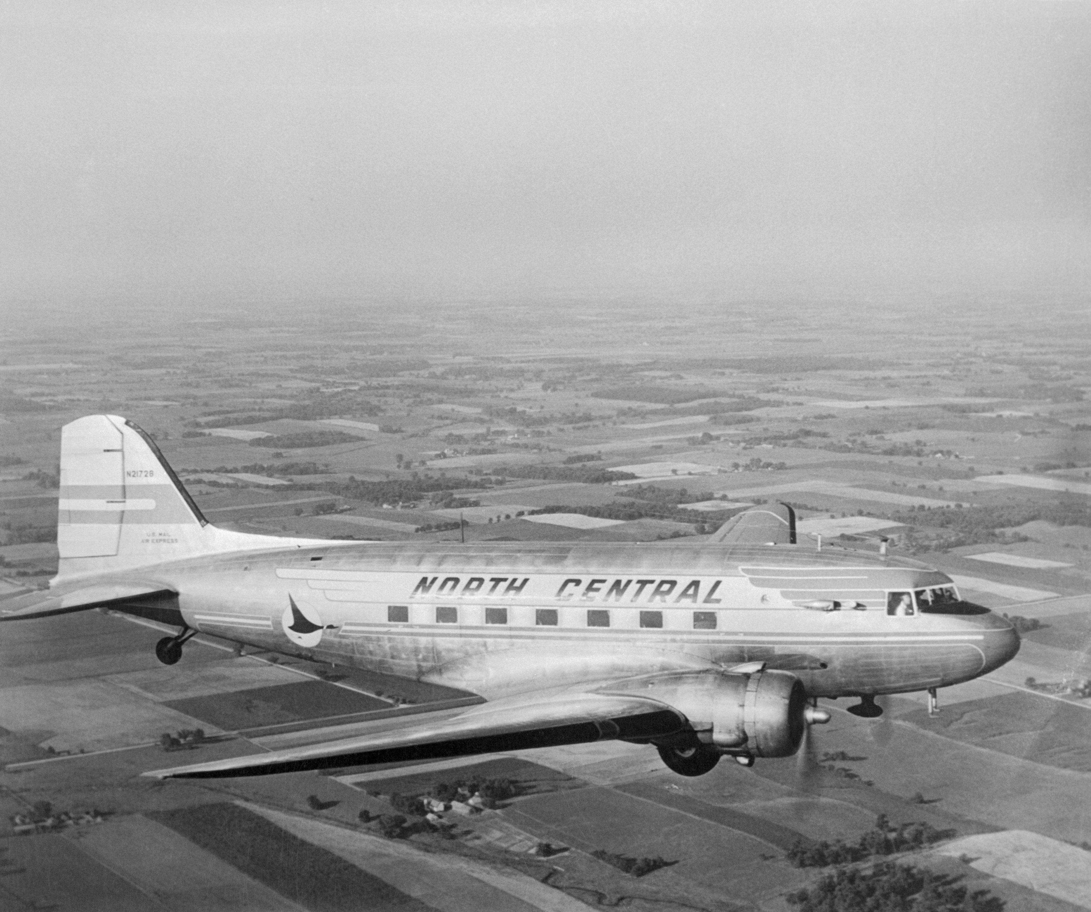 GettyImages-515550714 - Black and White of A Douglas DC-3 of North Central Airlines in flight by Getty Images