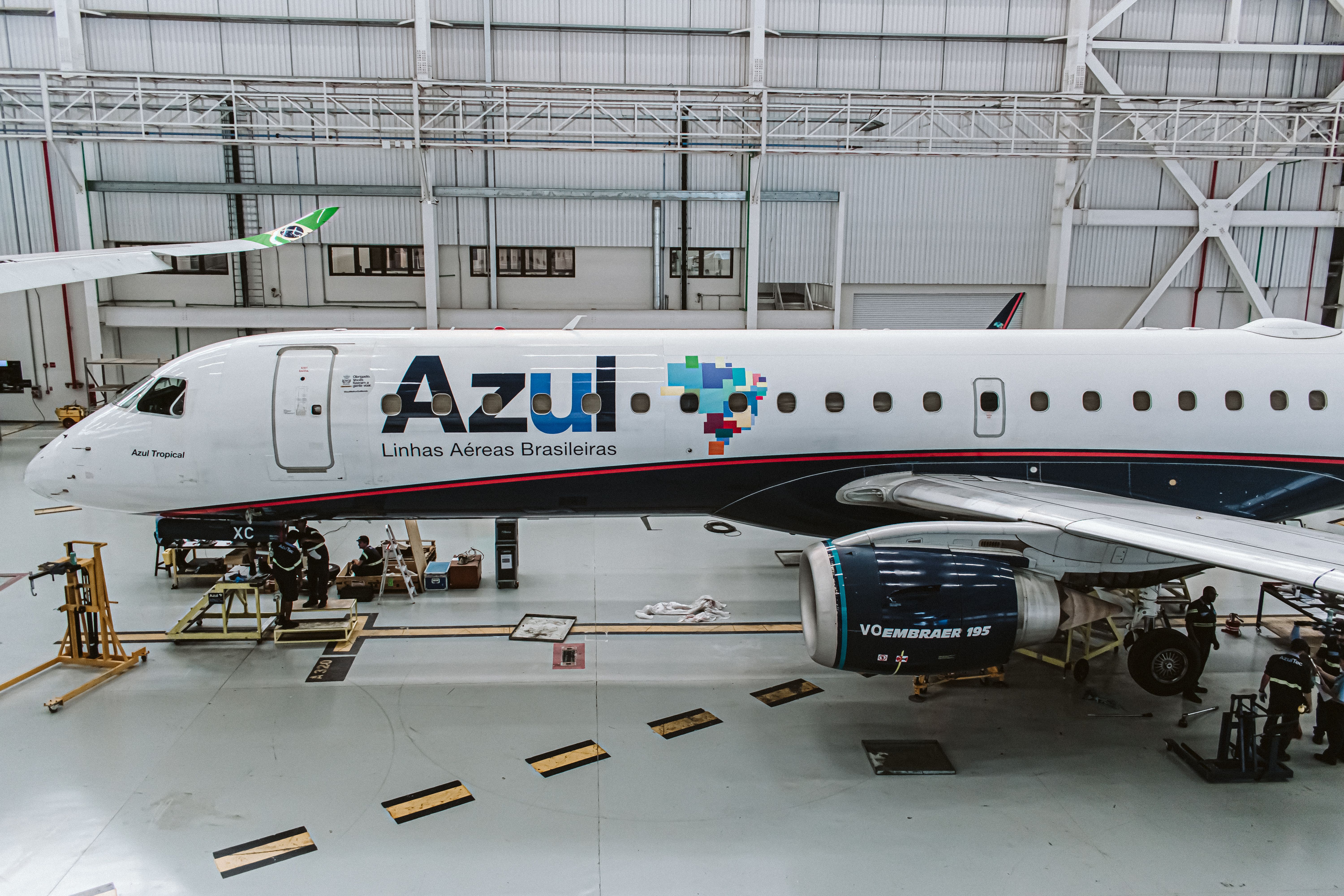 An Azul Embraer aircraft parked inside a hangar at Viracopos, Brazil. 