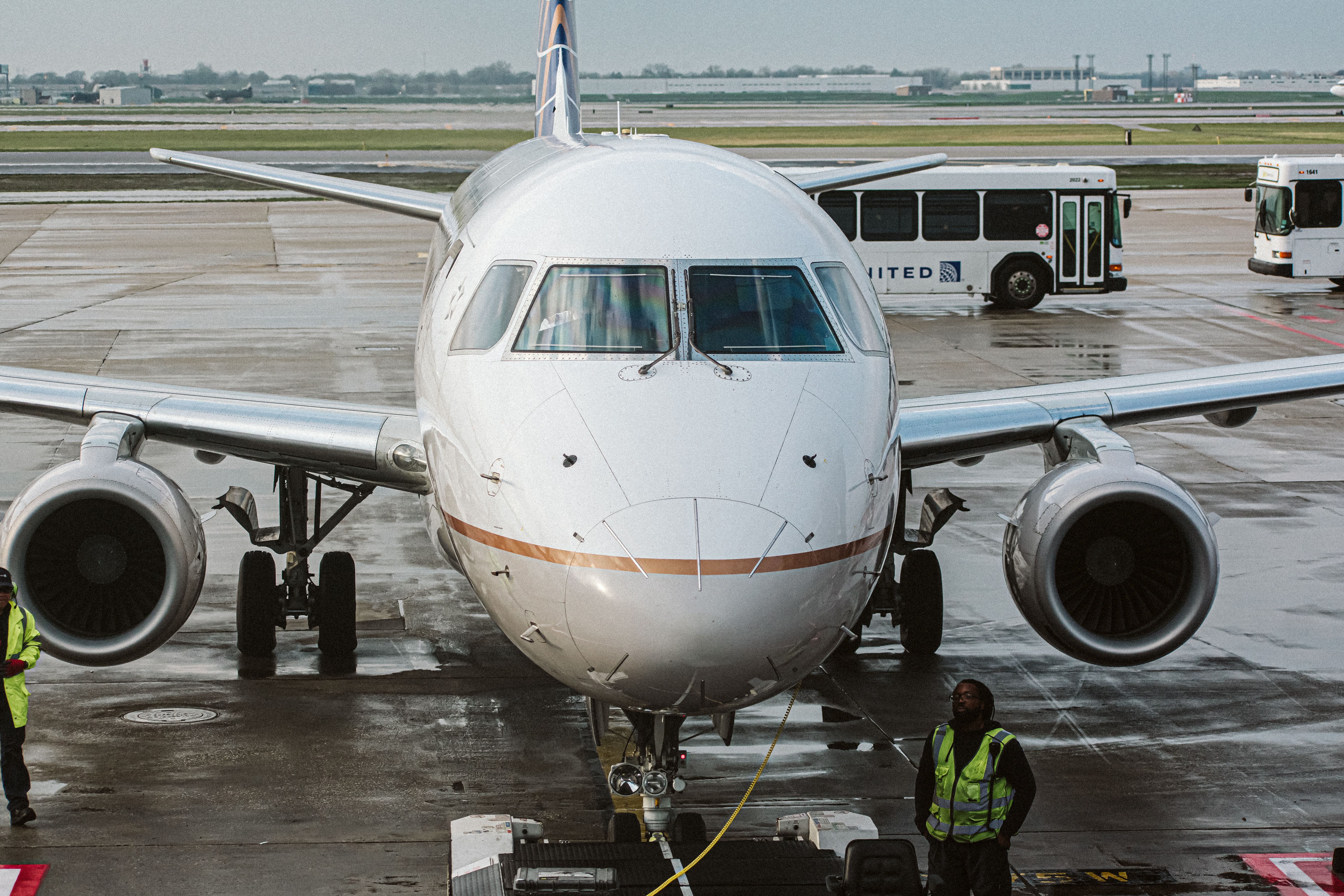 United Express Embraer E175 parked at gate at ORD