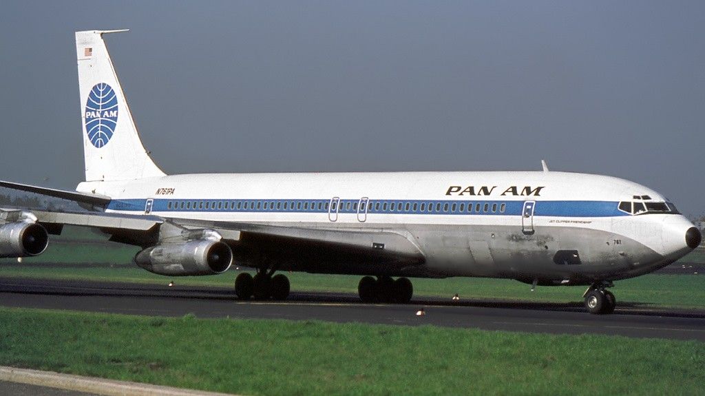 A Pan Am Boeing 707-321B on an airport apron.