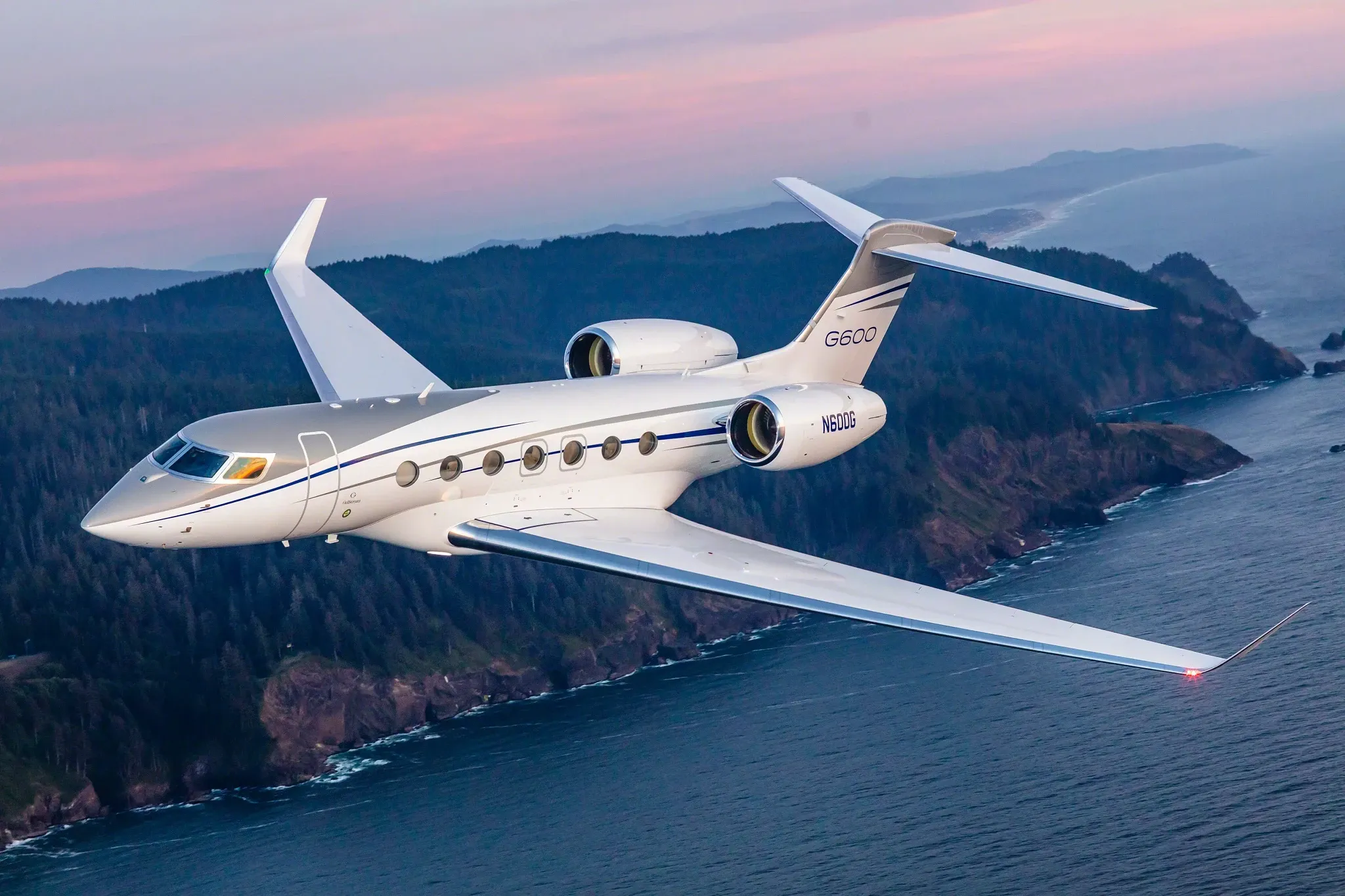 A Gulfstream G600 seen flying over the coast.