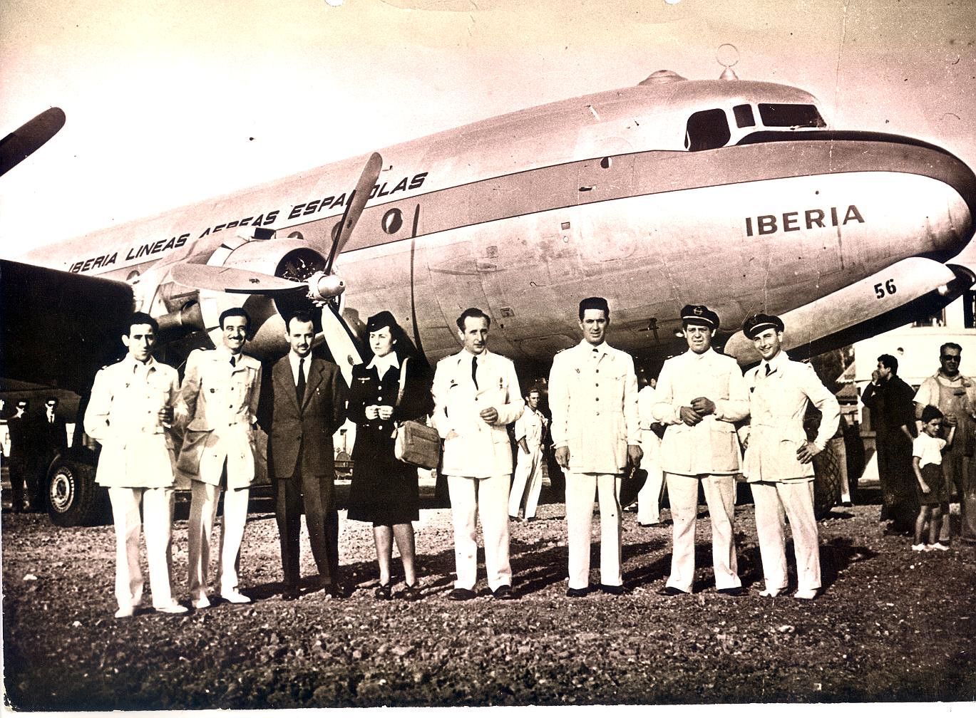 Crew in front of old Iberia aircraft 