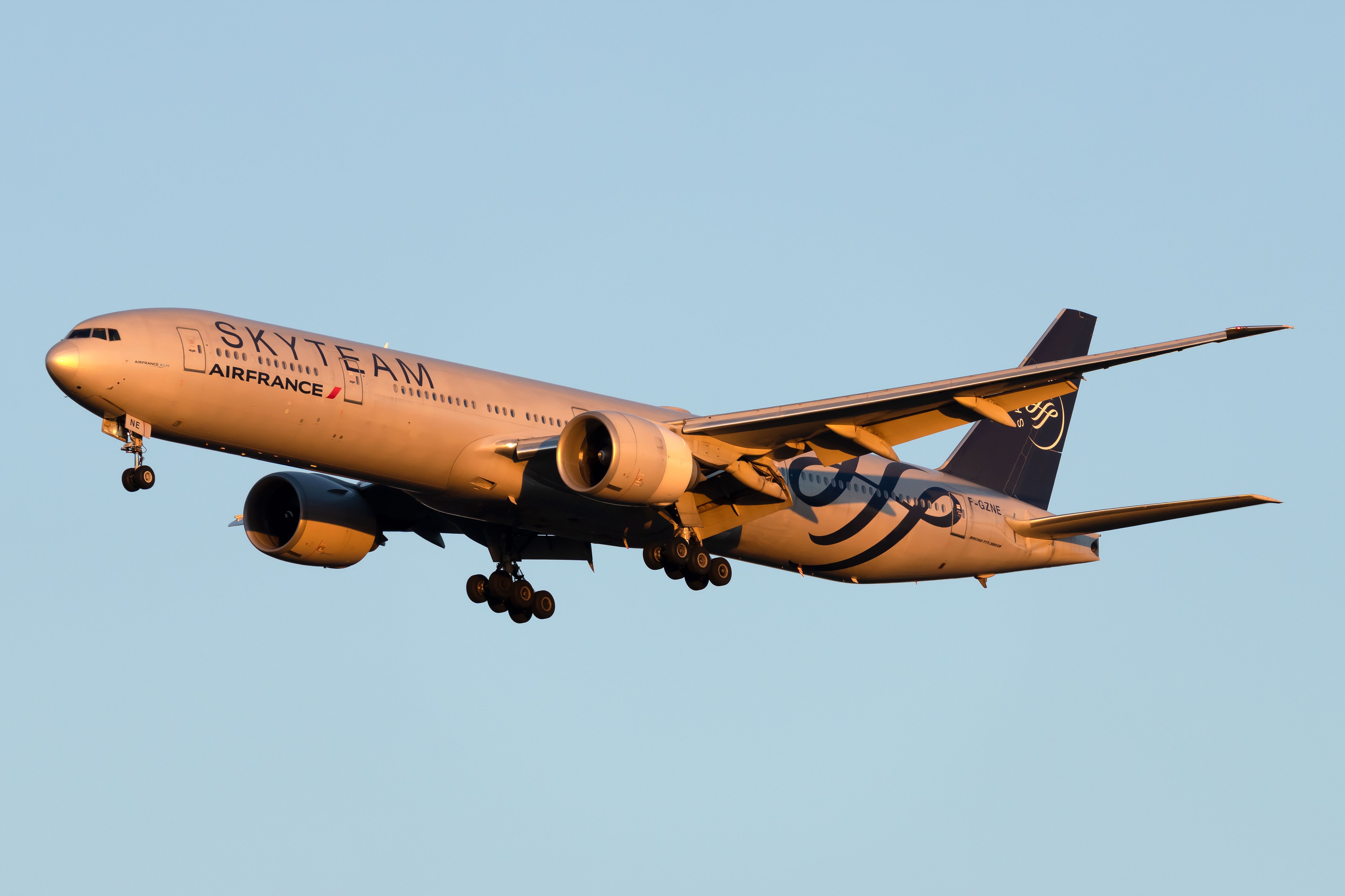 An Air France Boeing 777-300ER in SkyTeam Livery flying in the sky.