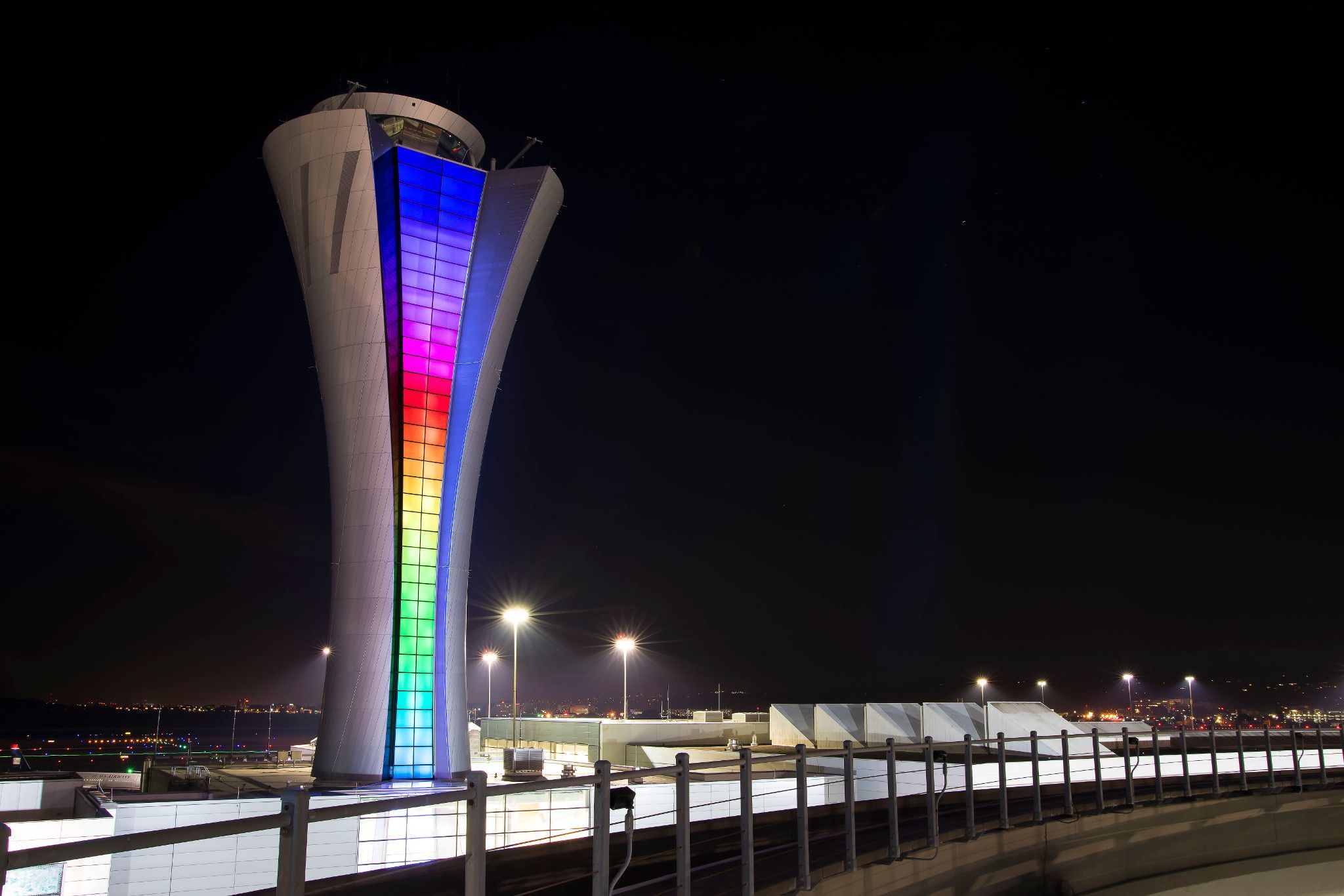 SFO air traffic control tower lit up at night for Pride month