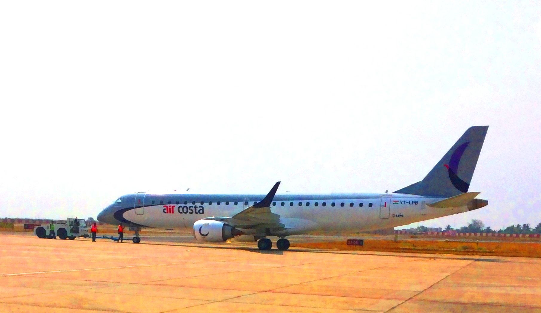 Air Costa Embraer aircraft on the groun