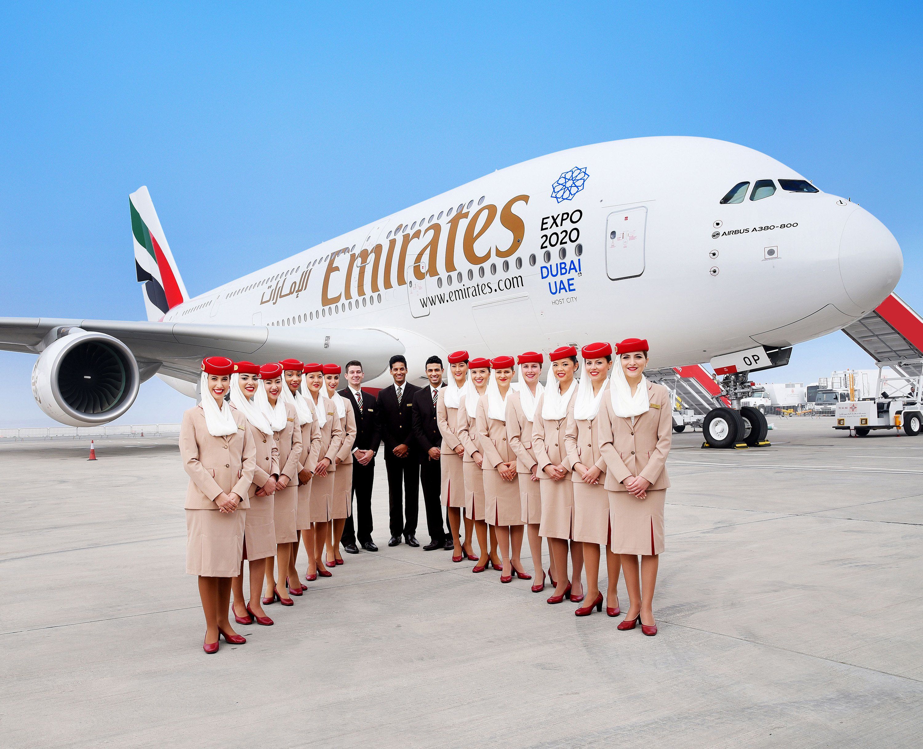 Emirates cabin crew outside aircraft