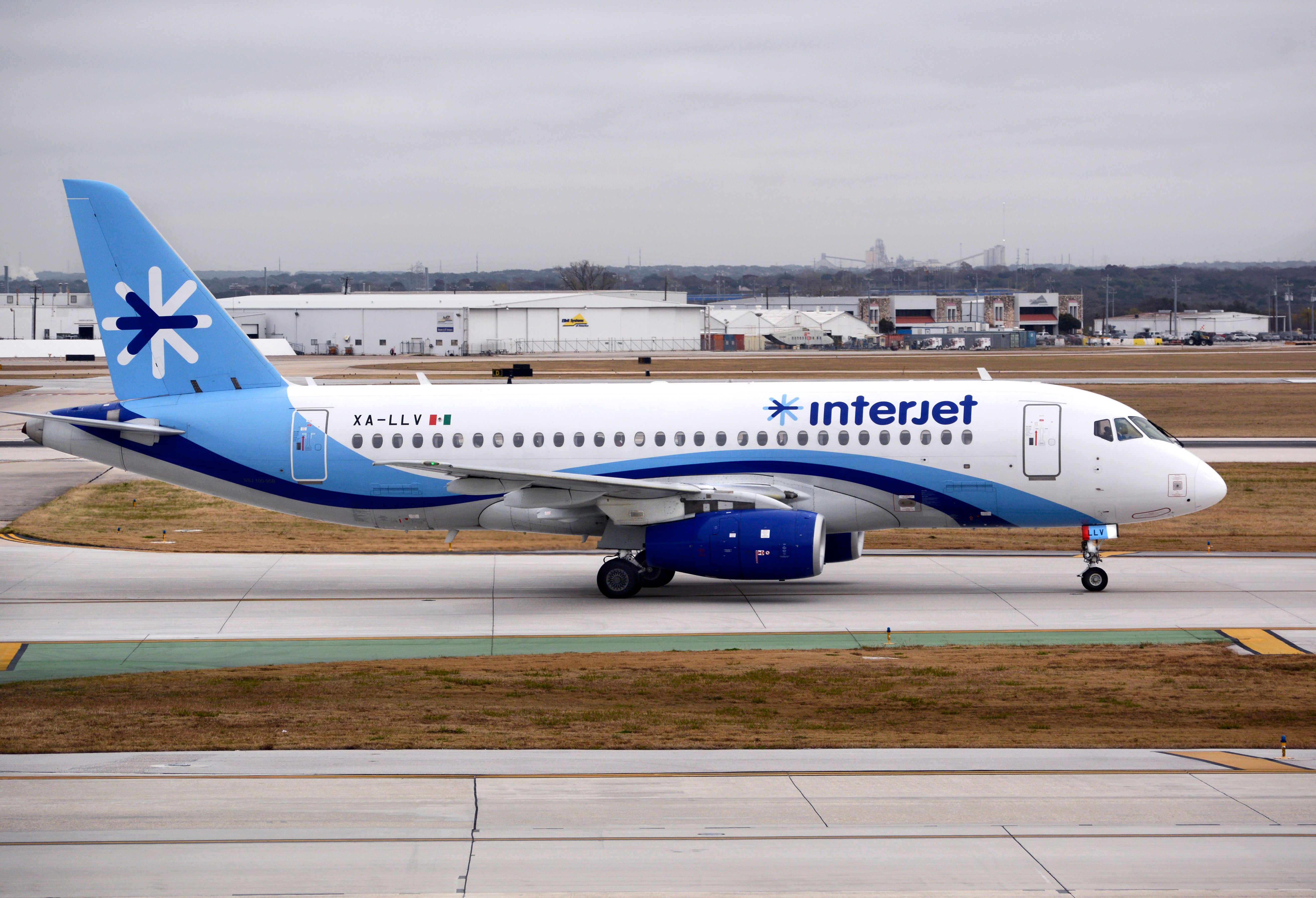 An Interjet Airlines Sukhoi Superjet passenger jet taxis after landing at San Antonio International Airport in Texas. Interjet was a Mexican airline headquartered in Mexico City. 