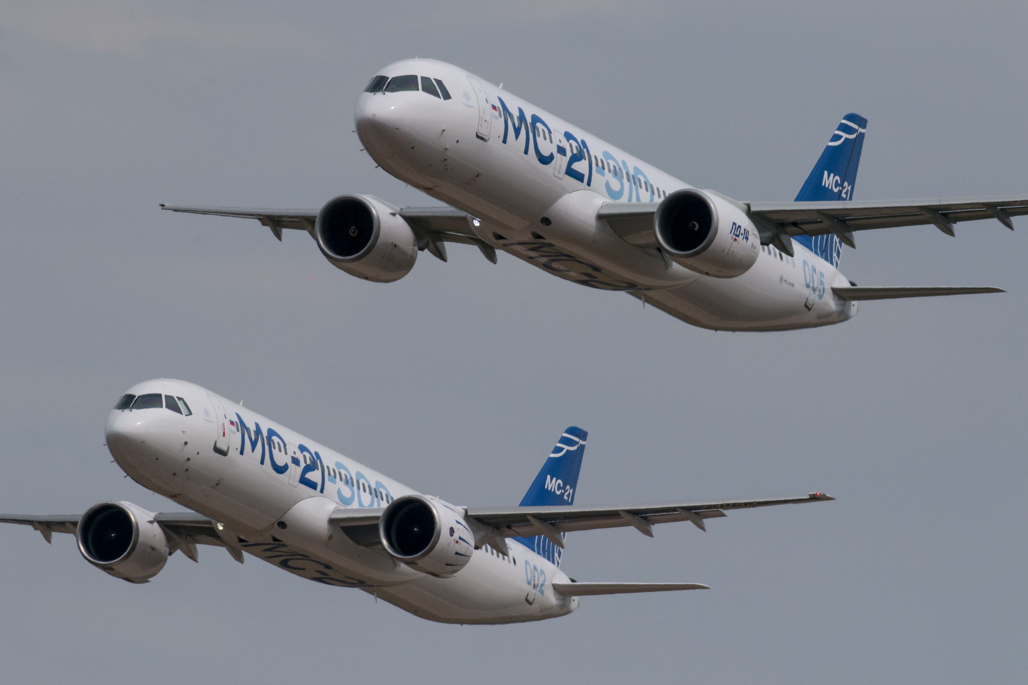 Irkut's MC-21-300 and MC-21-310 aircraft fly in formation.