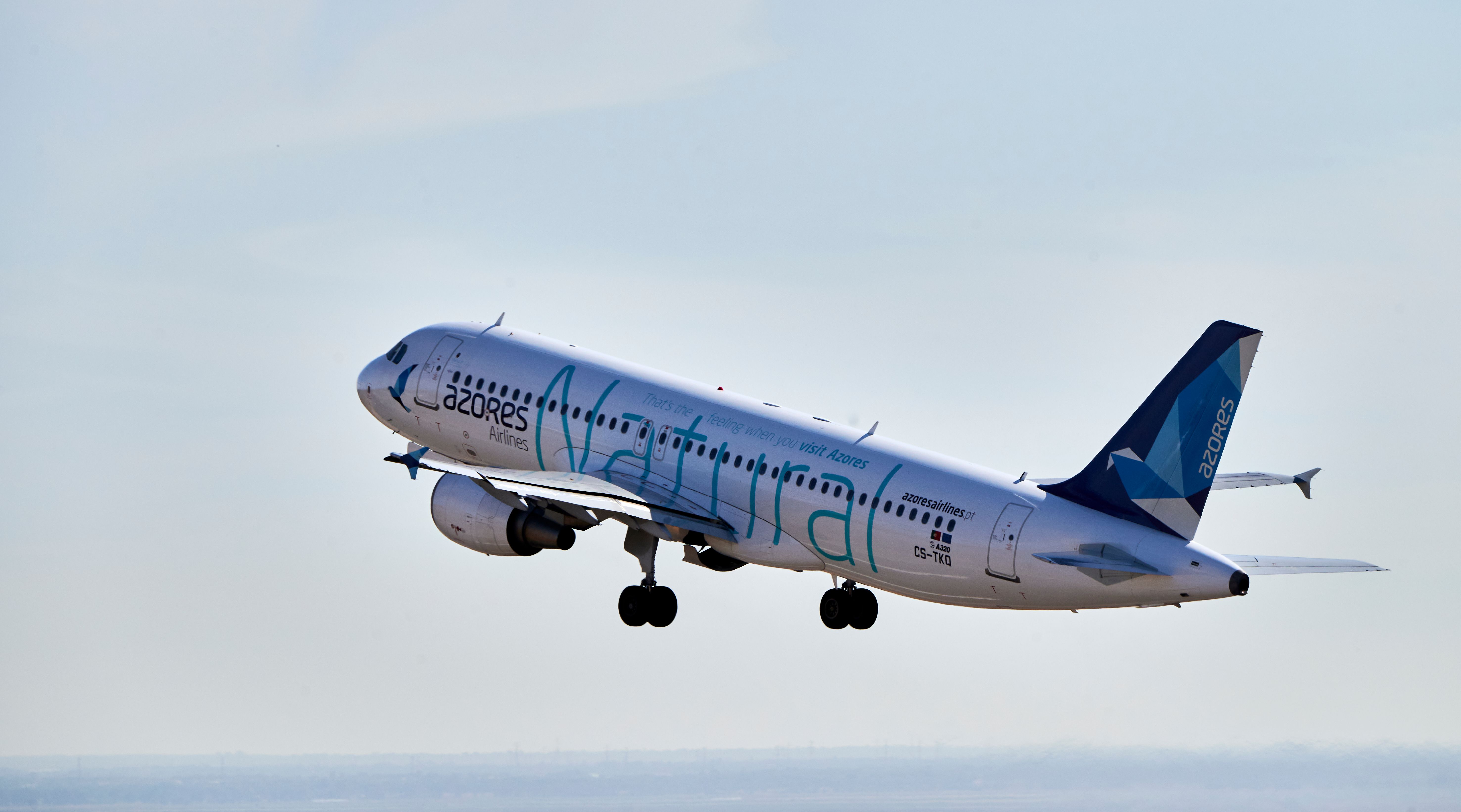 Azores Airlines Airbus A320 in Natural livery during take off