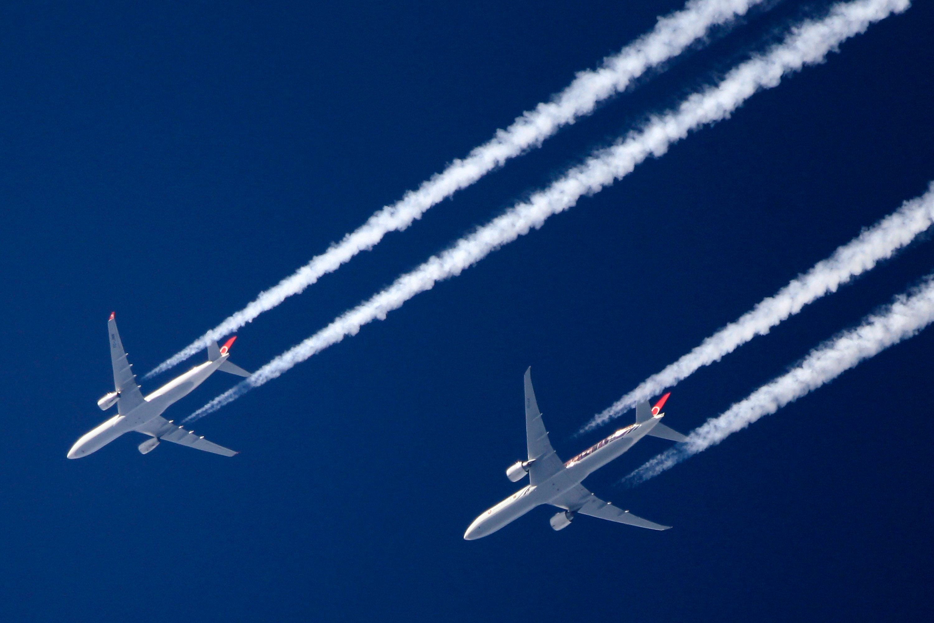 Two airplanes mid flight