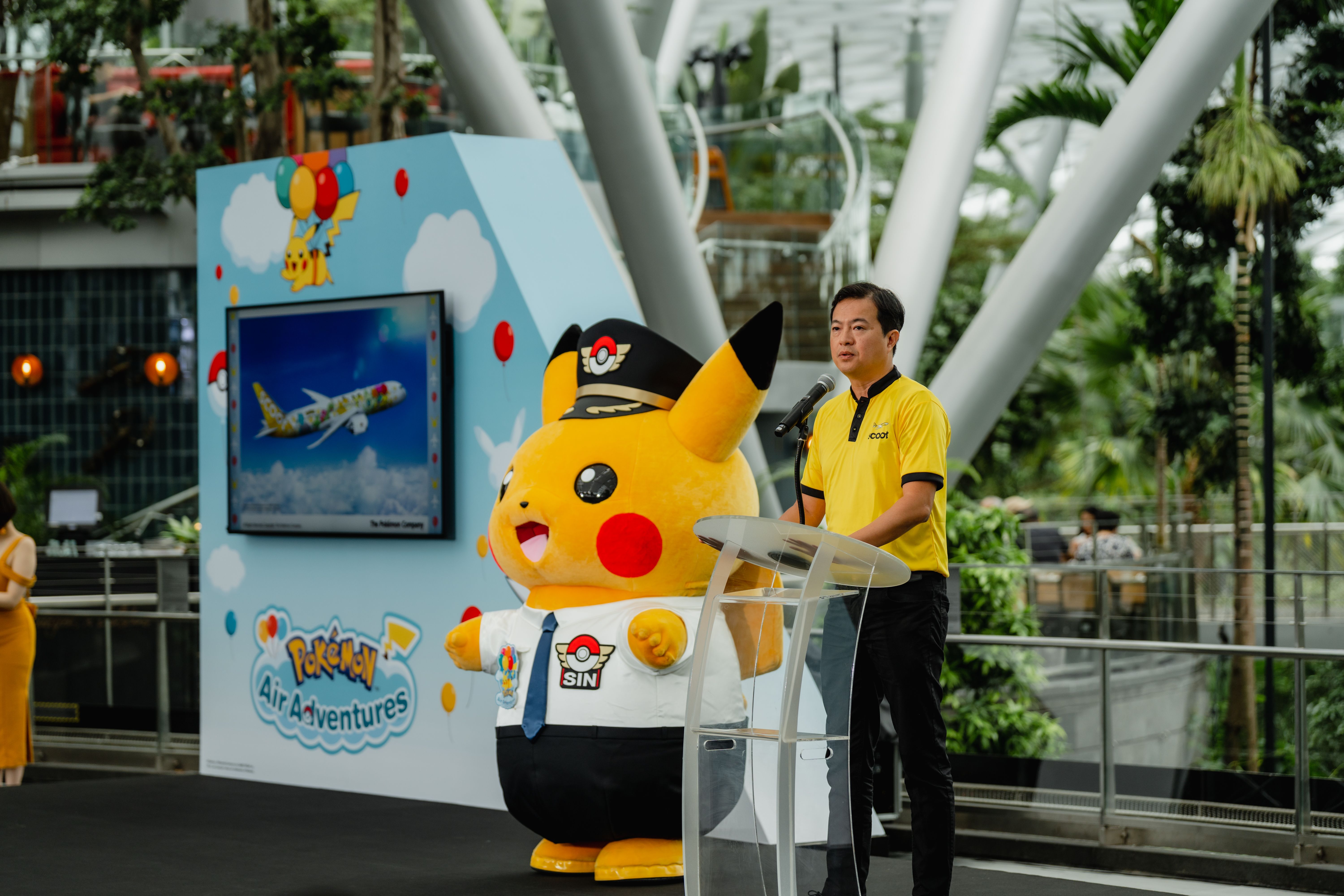 Leslie Thng, CEO, Scoot wtih the Pikachu pilot mascot