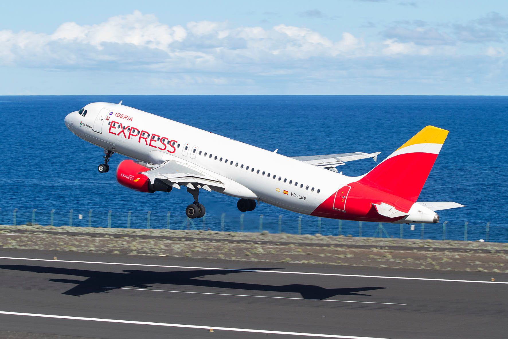 An Iberia Express aircraft taking off from runway