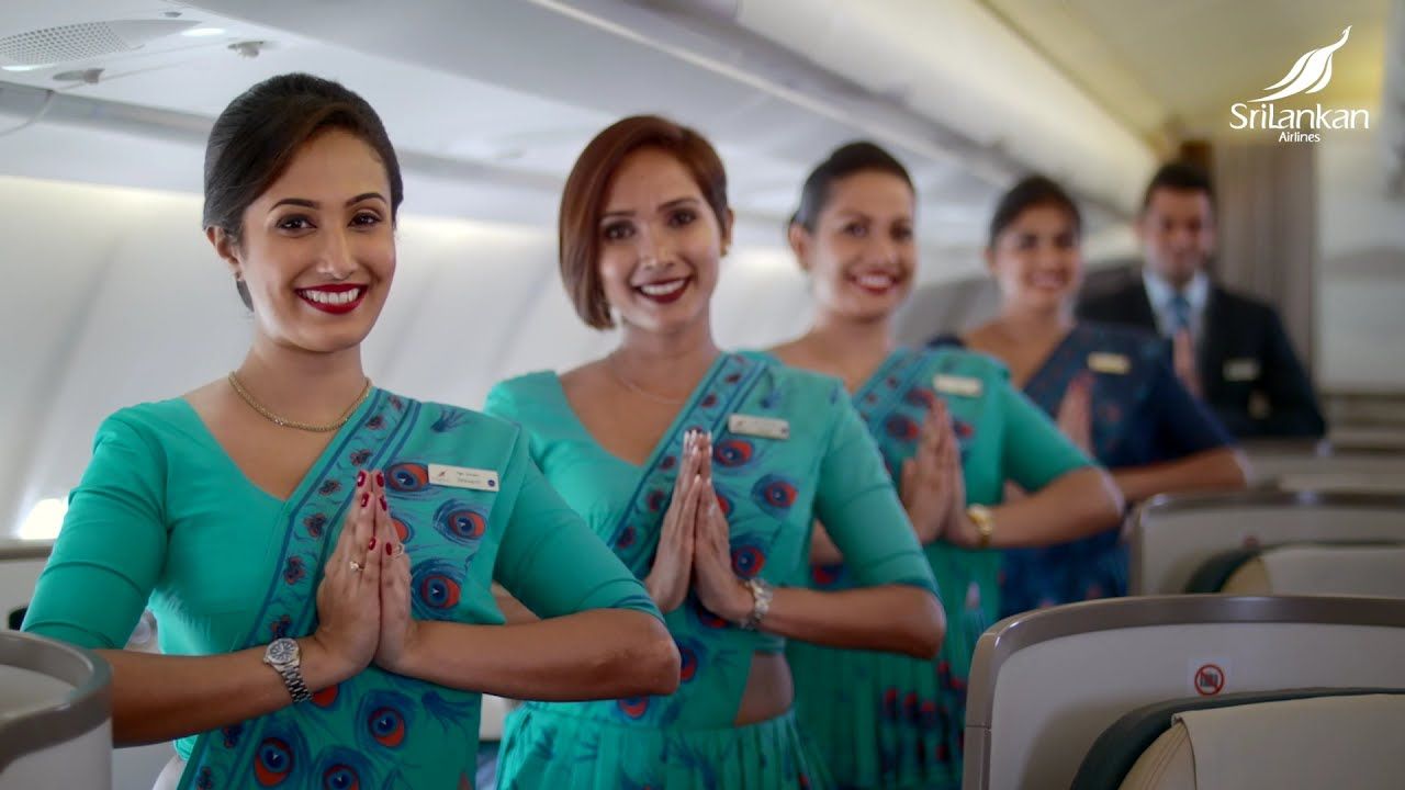 SriLankan Airlines flight attendants in the cabin.
