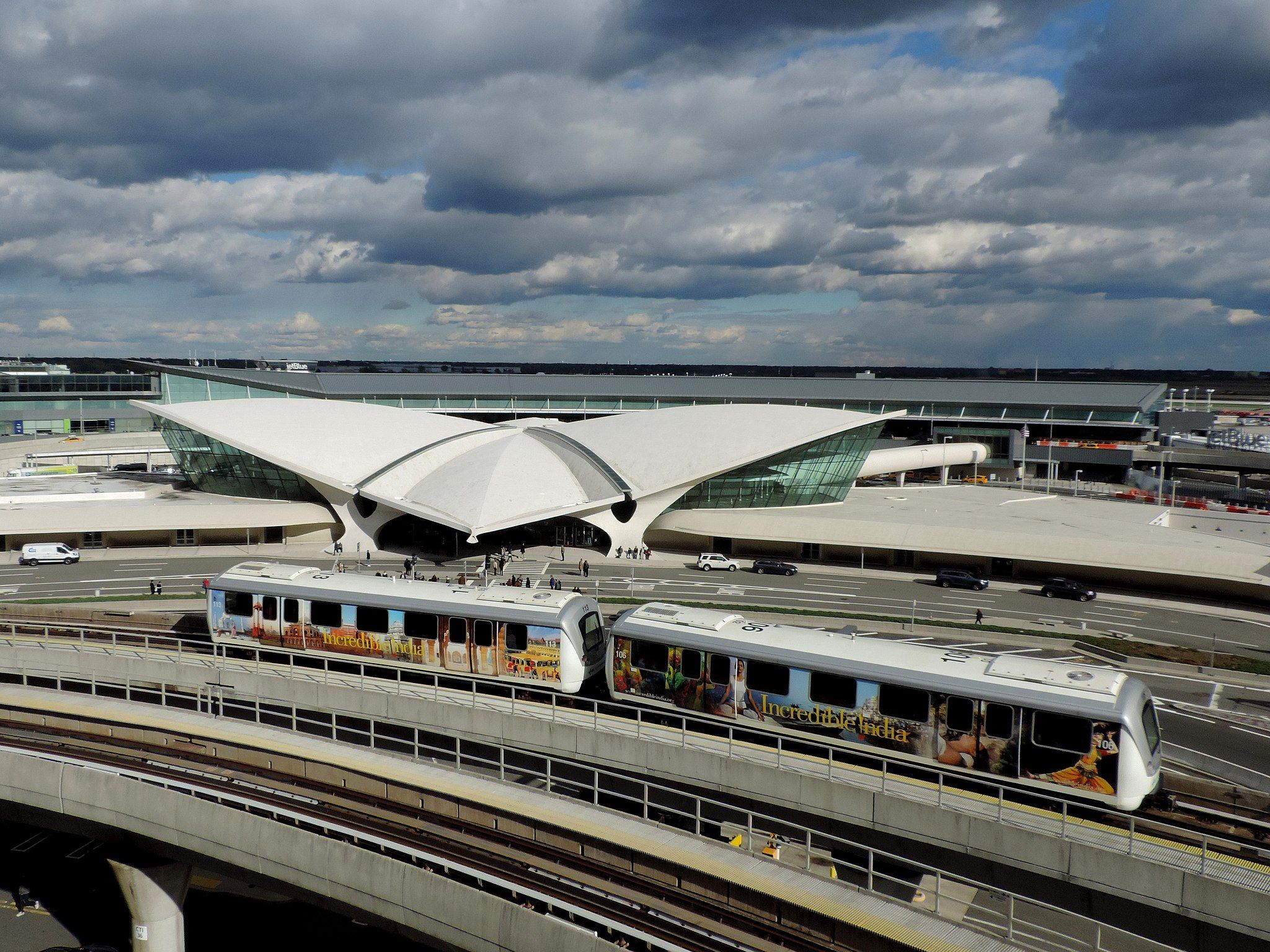 Elevated passenger train passes by the TWA Flight Center at JFK International Airport