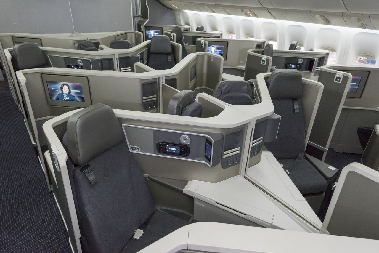 Inside the business class cabin of an American Airlines widebody aircraft.