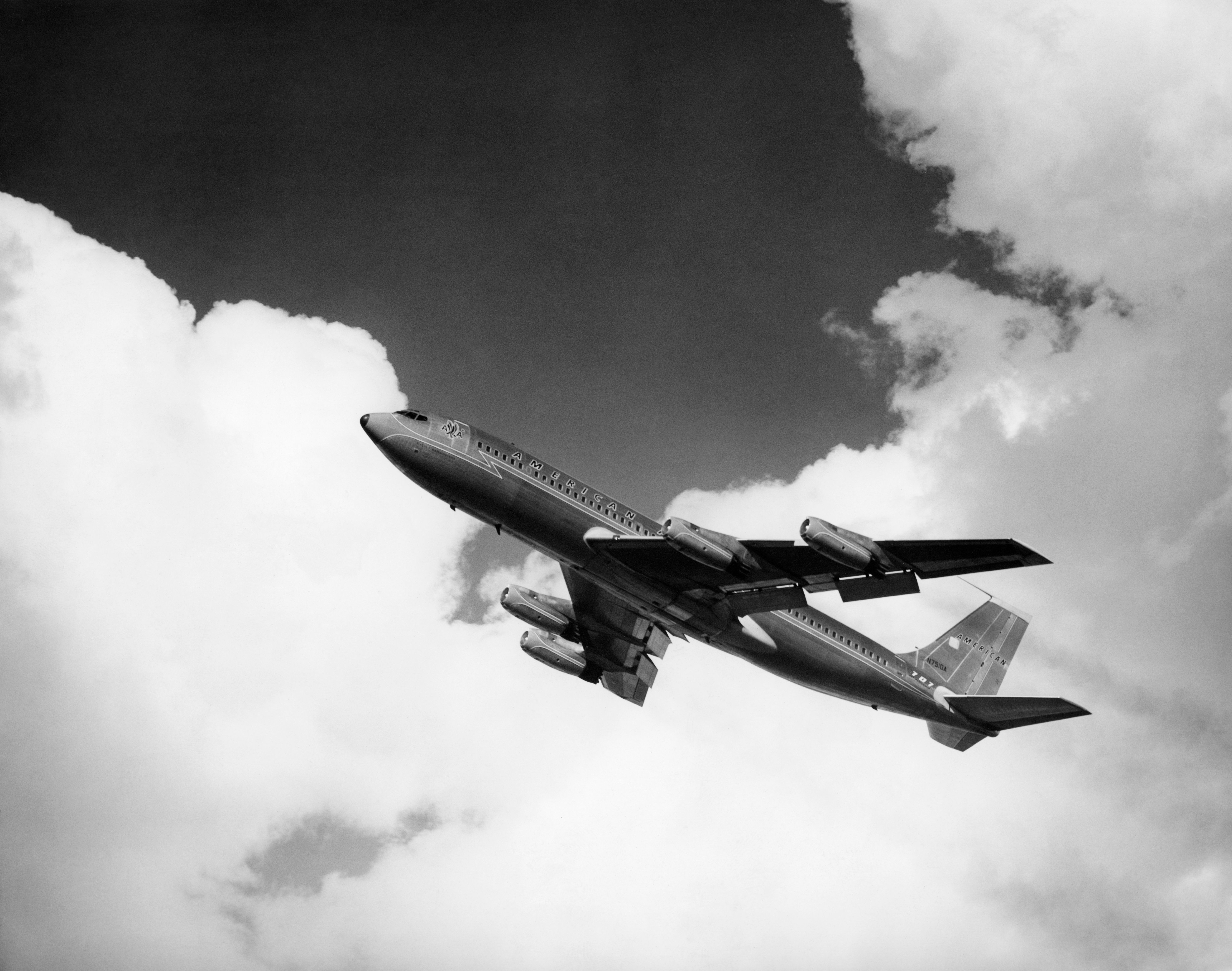 American 707 passing through the clouds