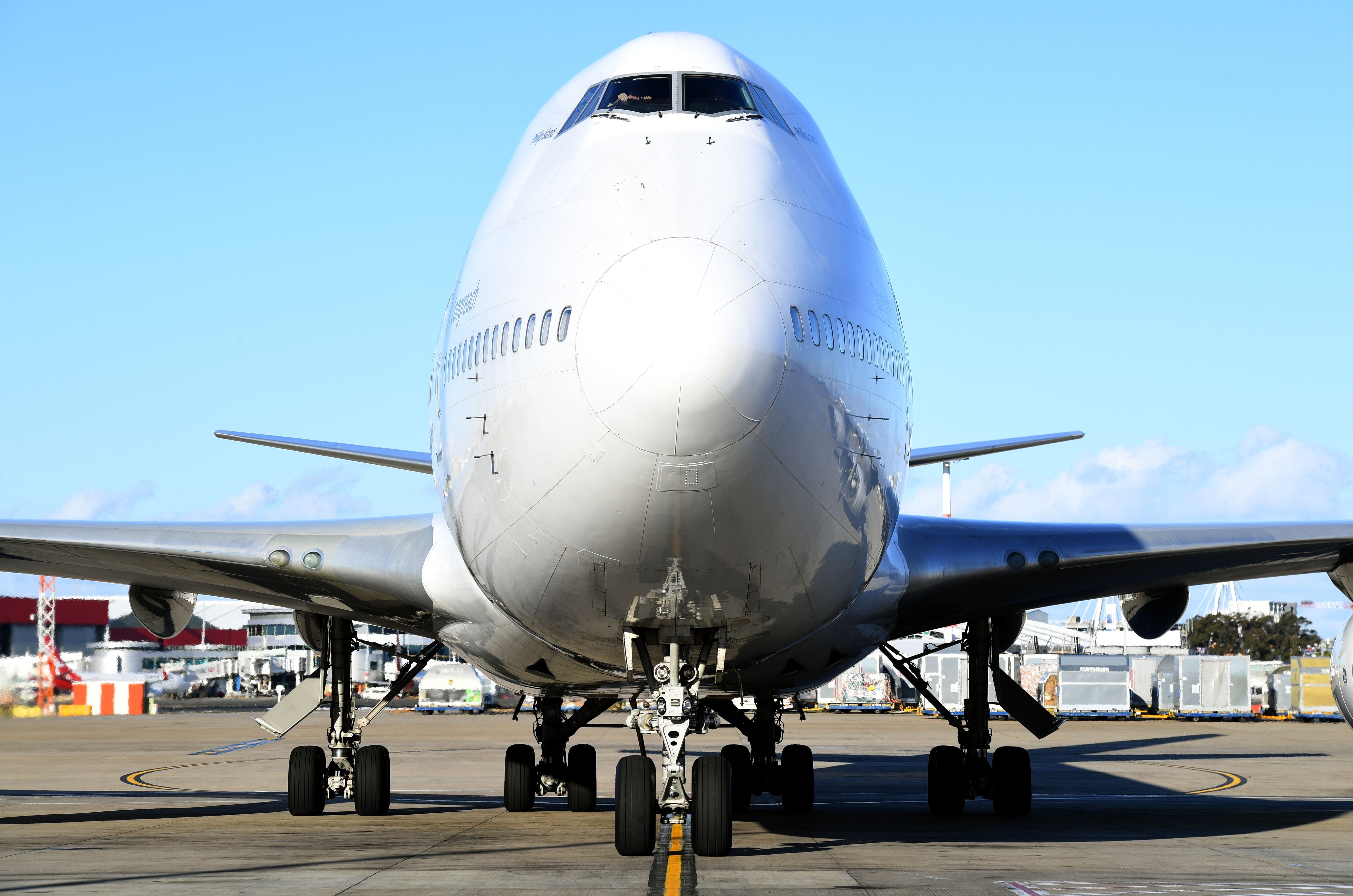 A Qantas Boeing 747 is seen from a head on view at Sydney Airport.