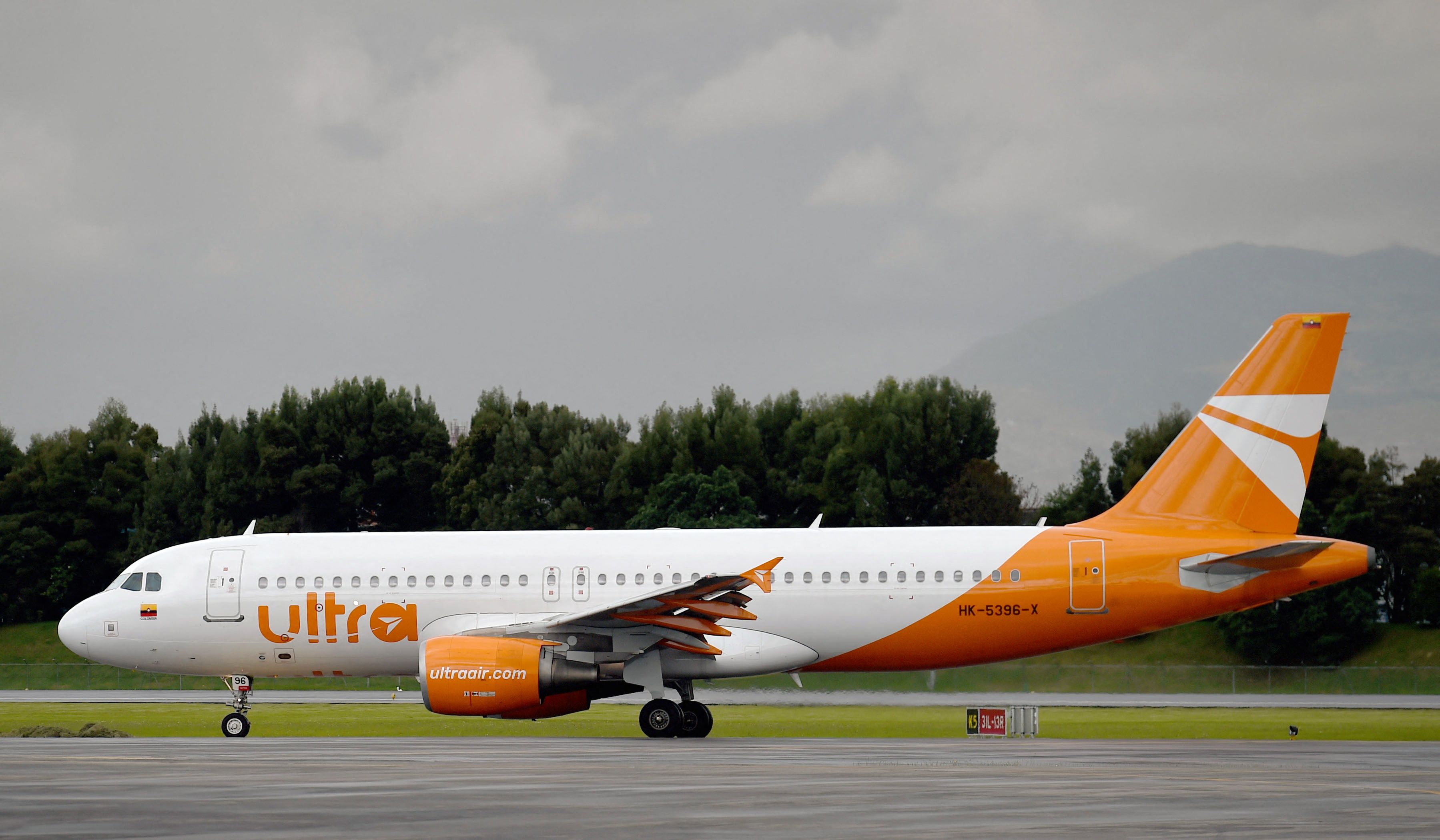 An Ultra air plane arrives at El Dorado International airport in Bogota, on May 14, 2022.